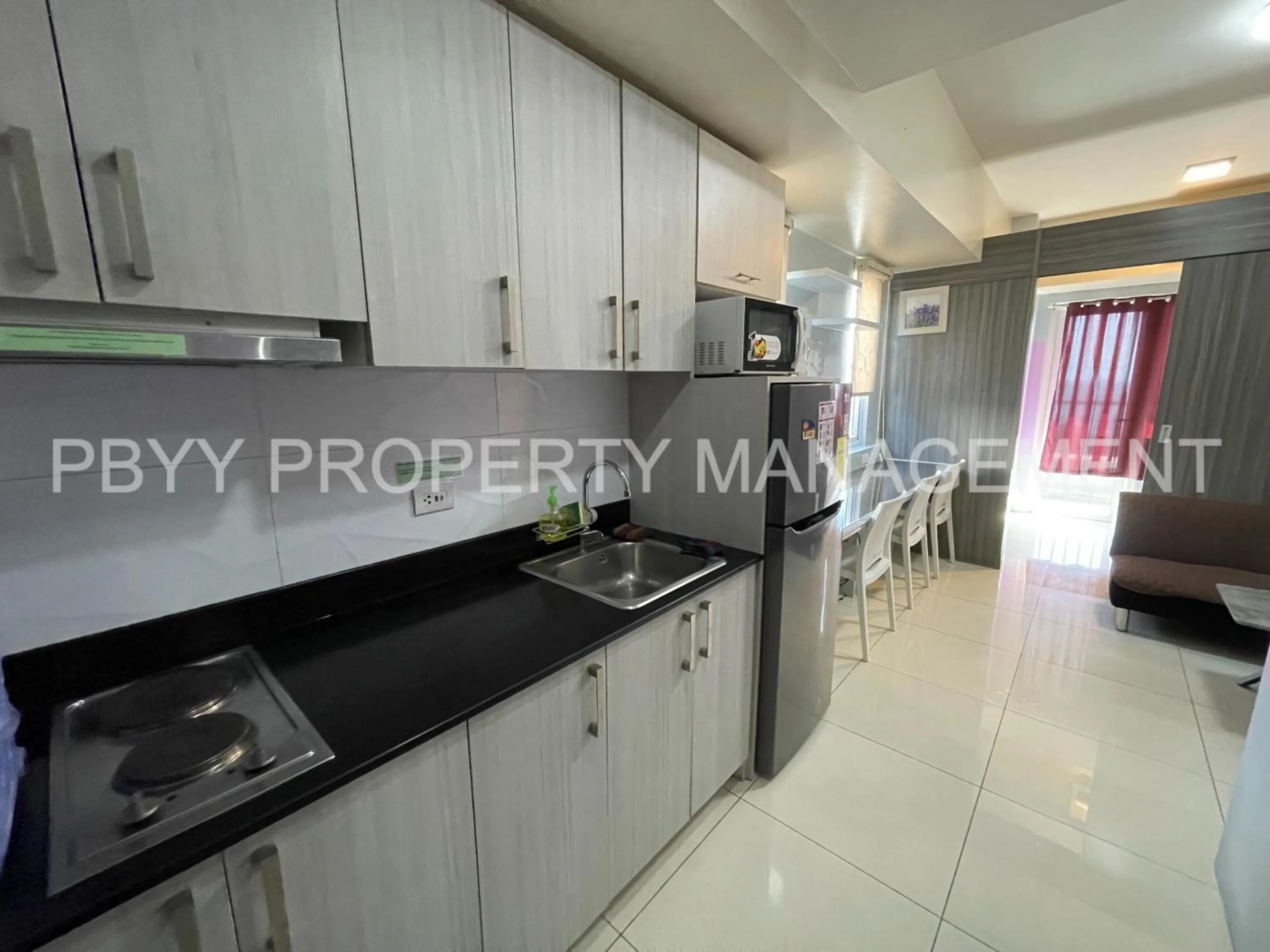 Kitchen or kitchenette, Kitchen/Kitchenette in Green Residences Stays by PBYY