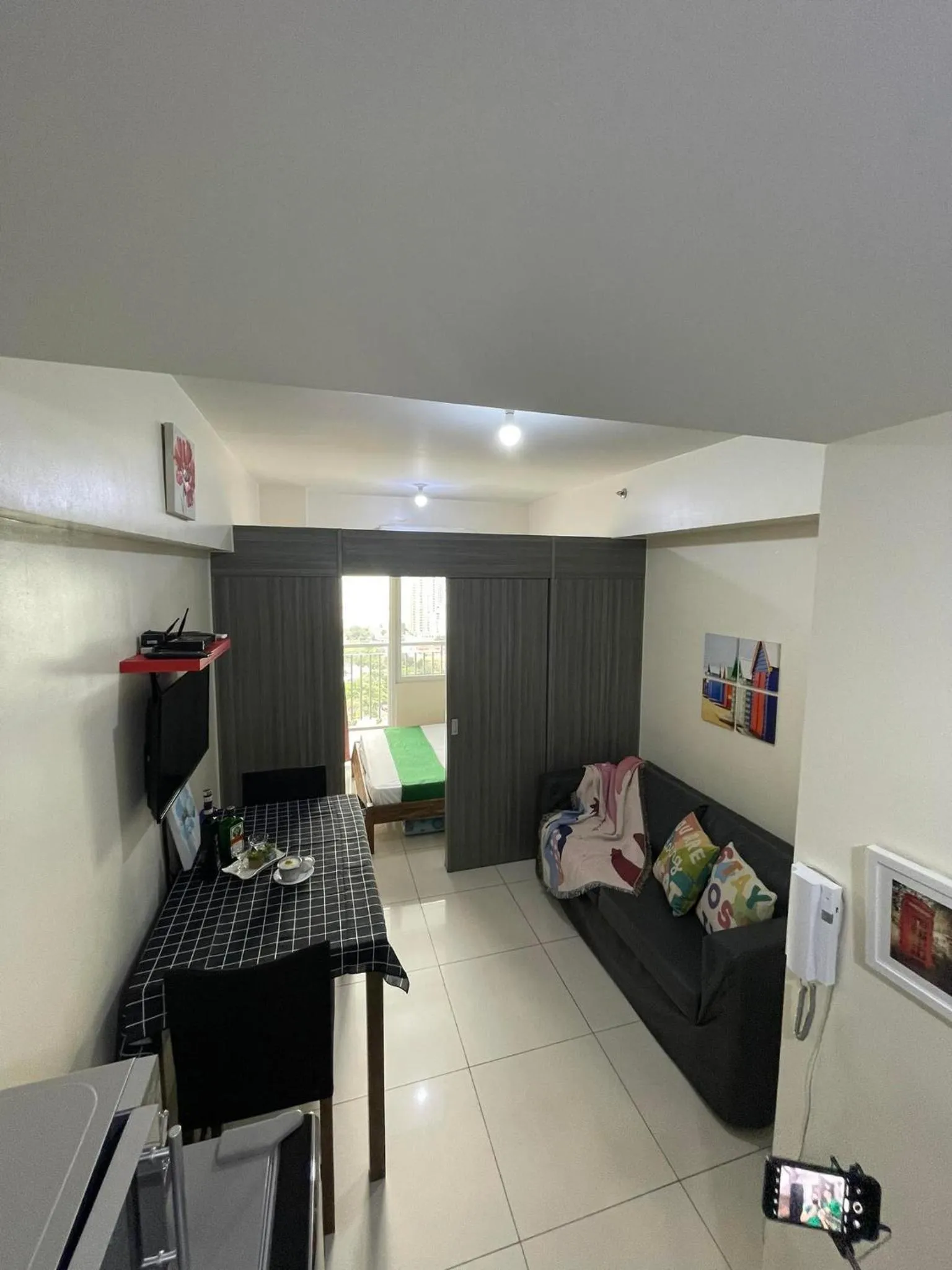 TV and multimedia in Green Residences Stays by PBYY