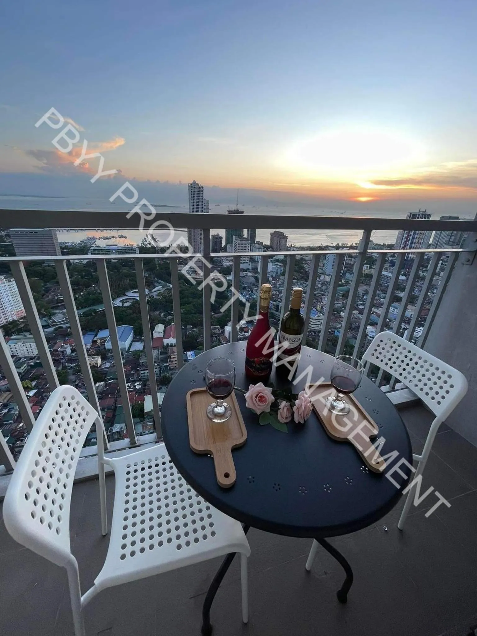 Balcony/Terrace in Green Residences Stays by PBYY