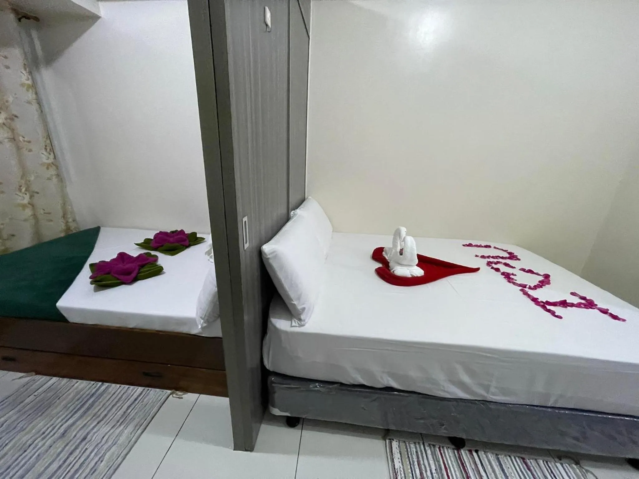 Bed in Green Residences Stays by PBYY