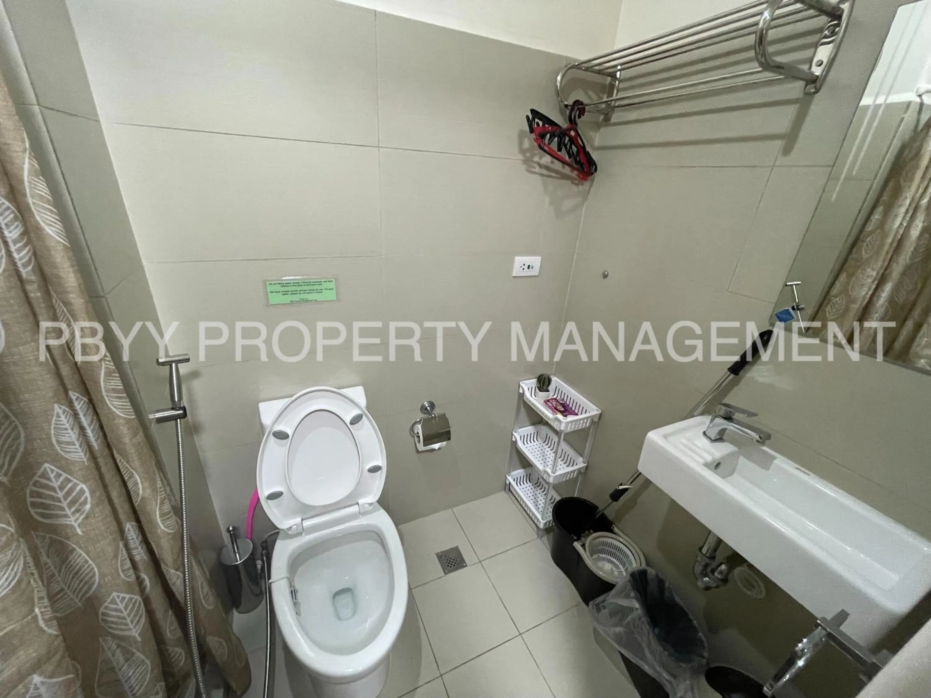 Bathroom in Green Residences Stays by PBYY