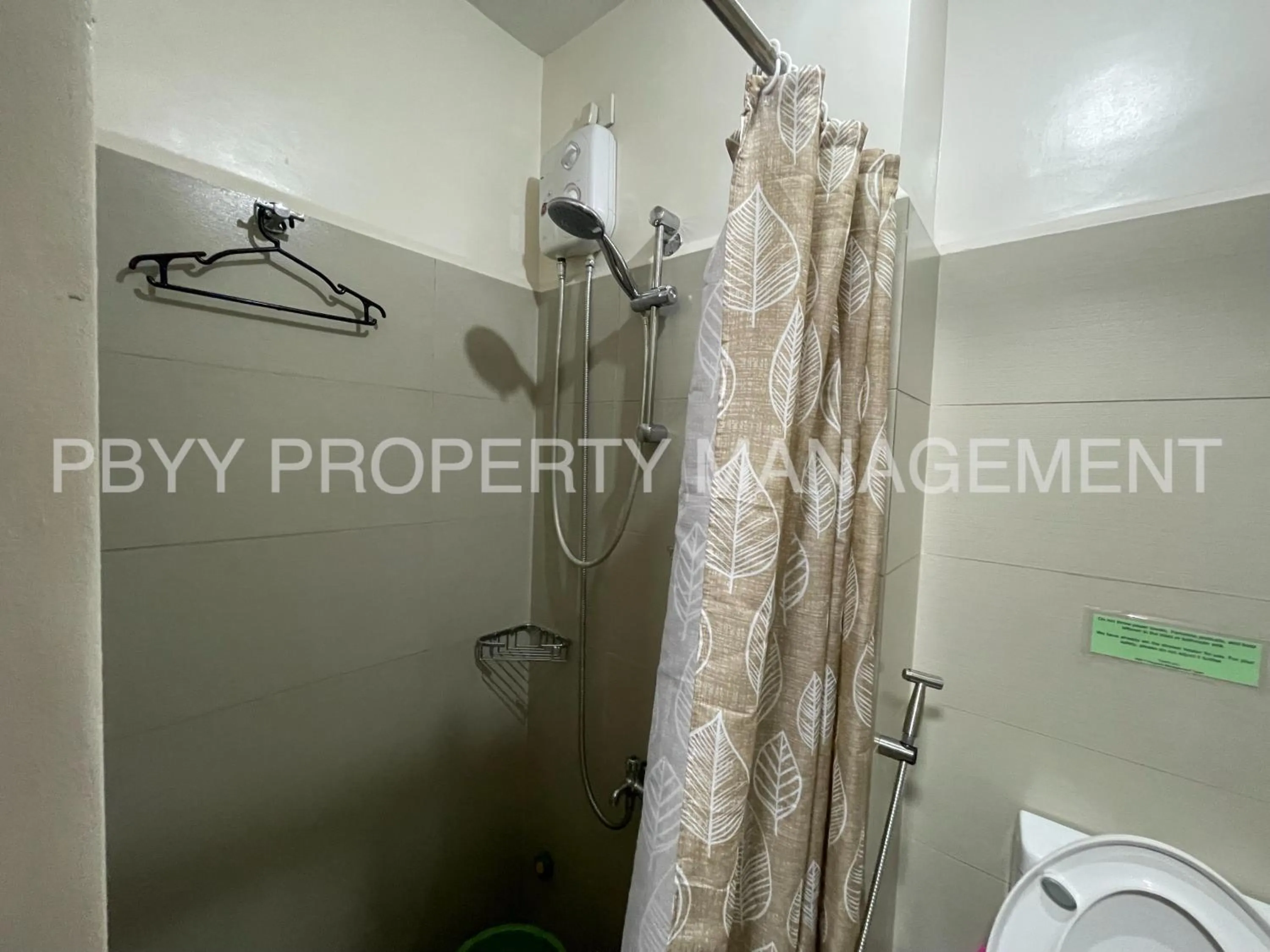 Bathroom in Green Residences Stays by PBYY