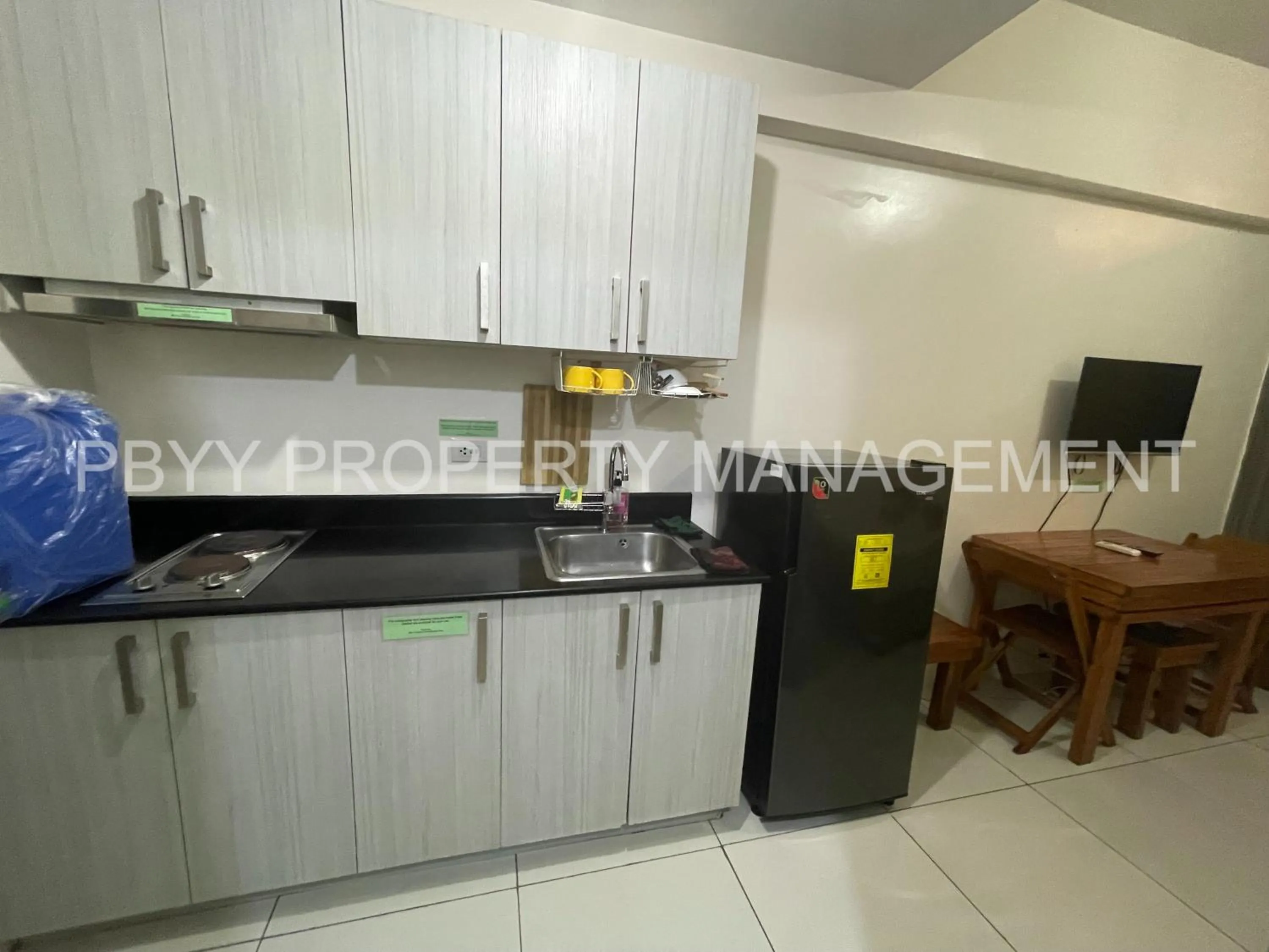 Kitchen or kitchenette, Kitchen/Kitchenette in Green Residences Stays by PBYY