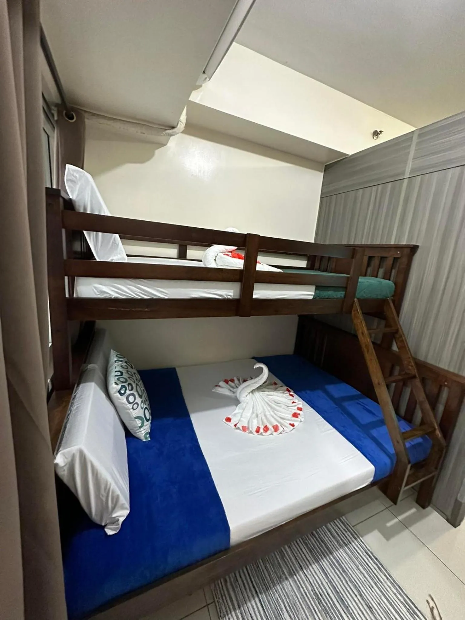 Bed, Bunk Bed in Green Residences Stays by PBYY