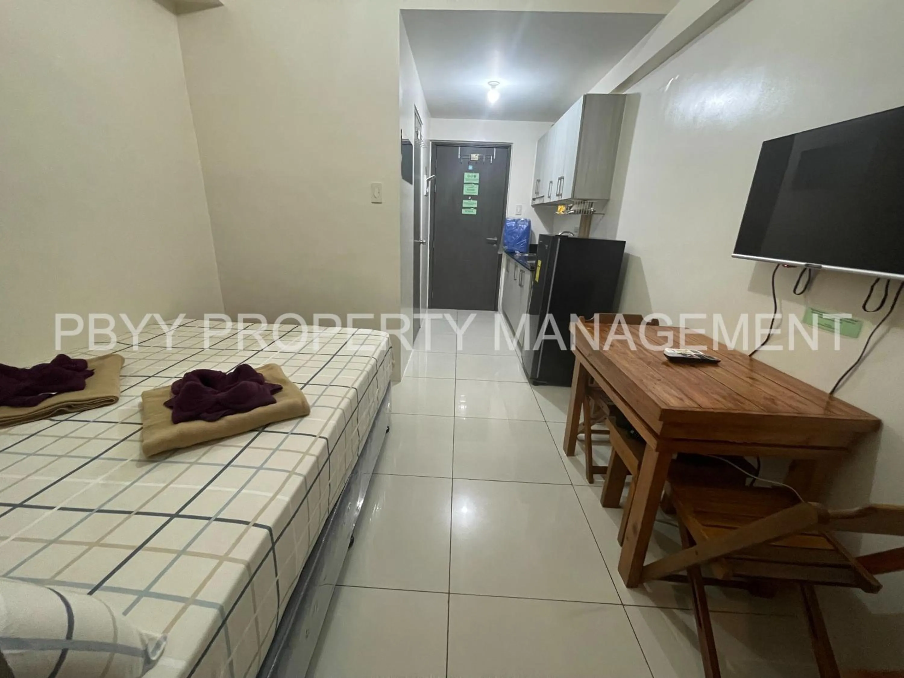 TV and multimedia in Green Residences Stays by PBYY