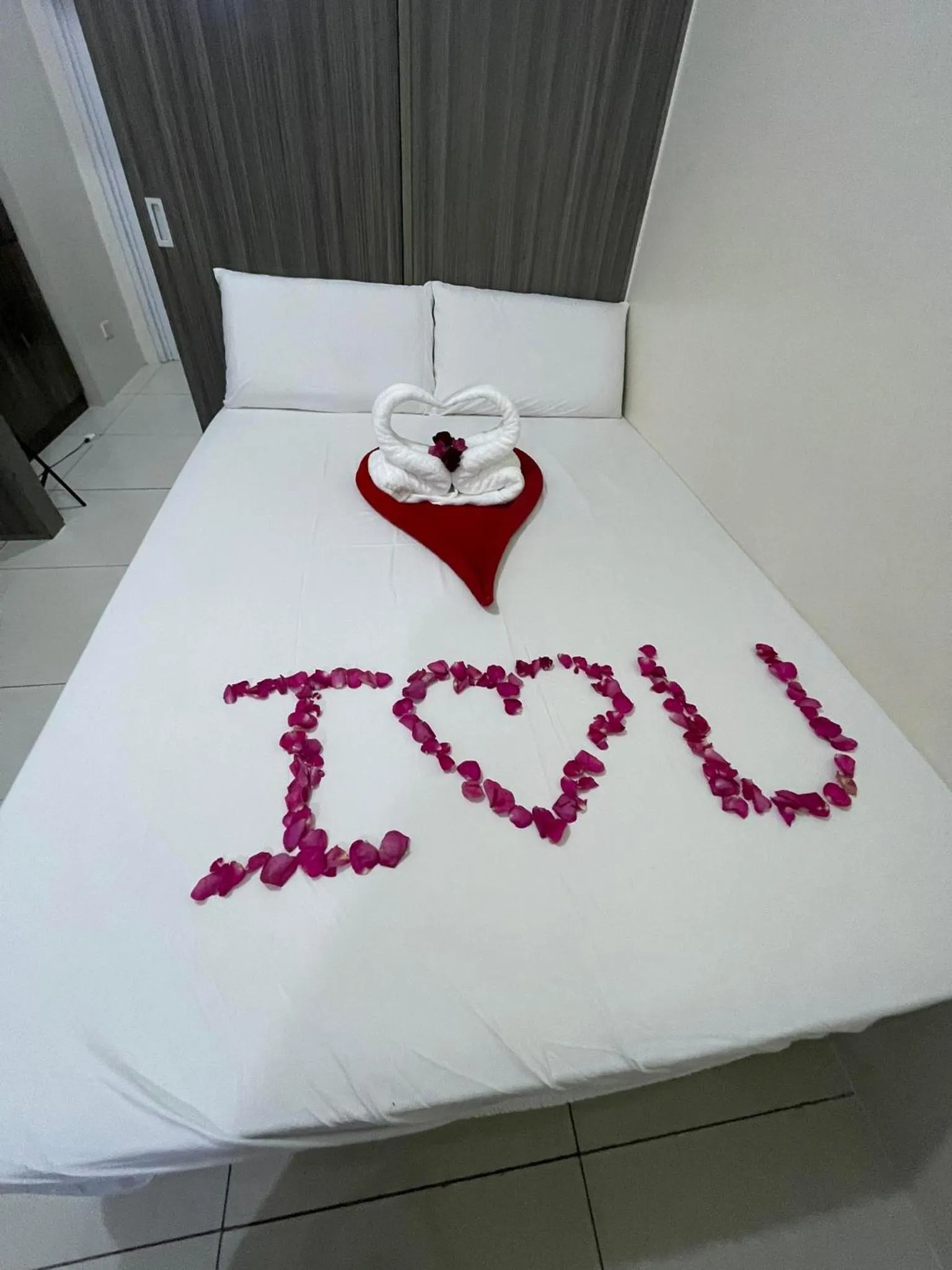 Bed in Green Residences Stays by PBYY