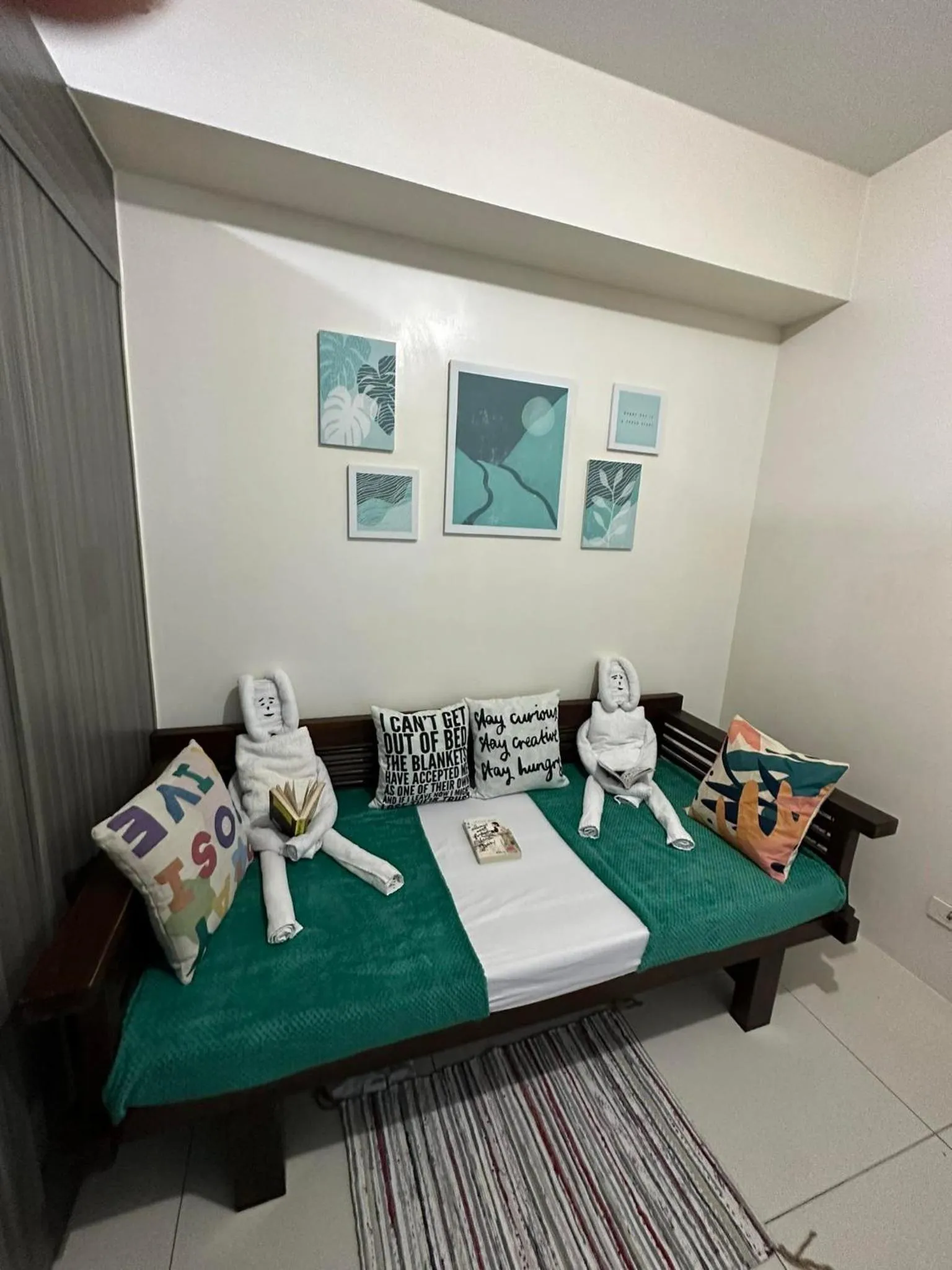 Bed in Green Residences Stays by PBYY