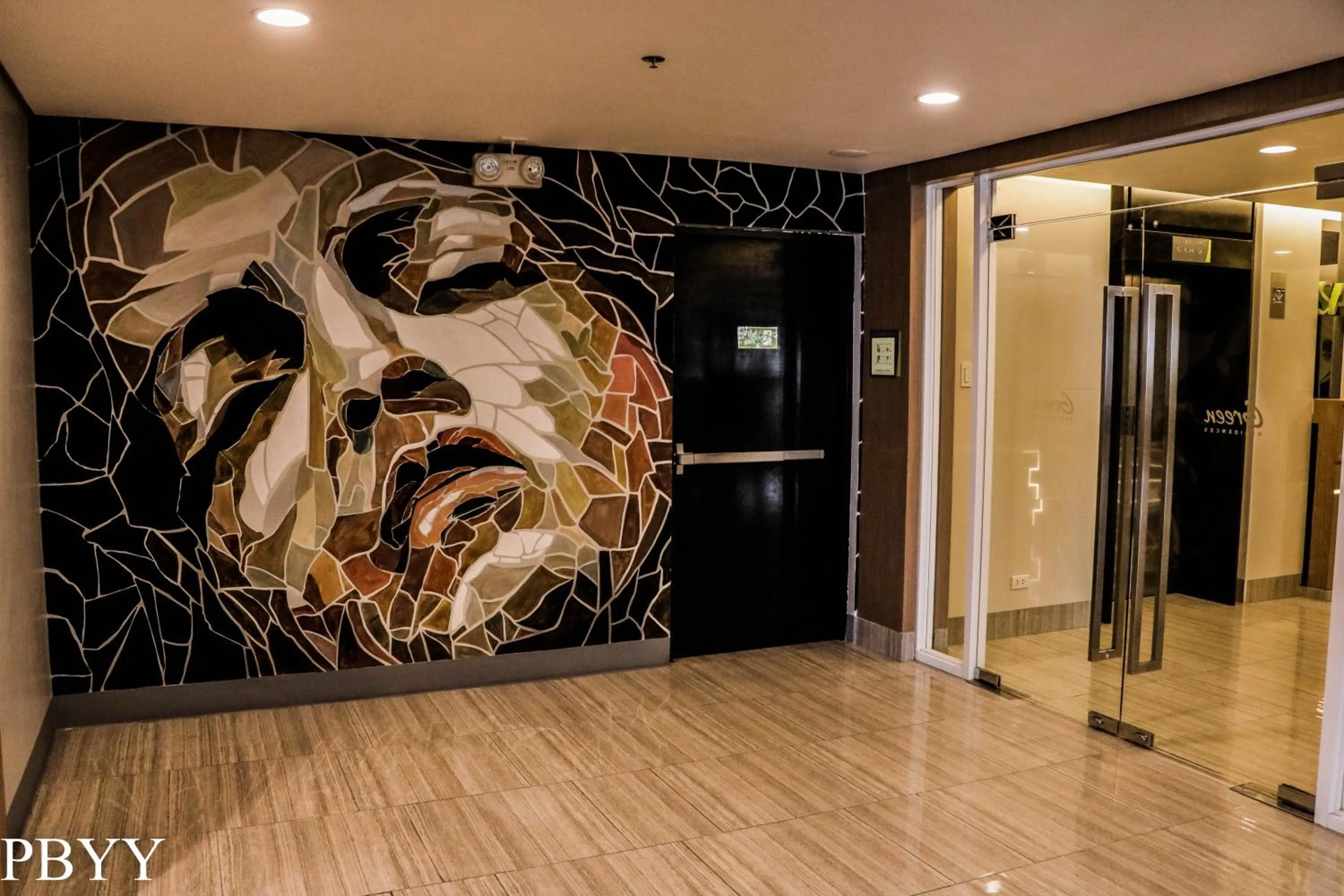 Property building in Green Residences Stays by PBYY