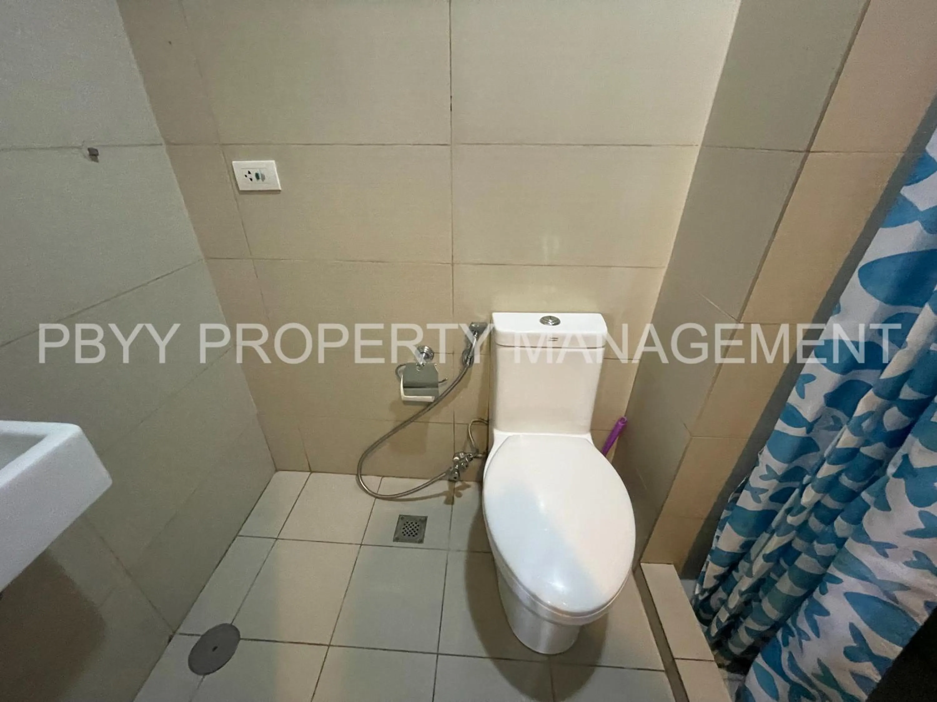 Bathroom in Green Residences Stays by PBYY