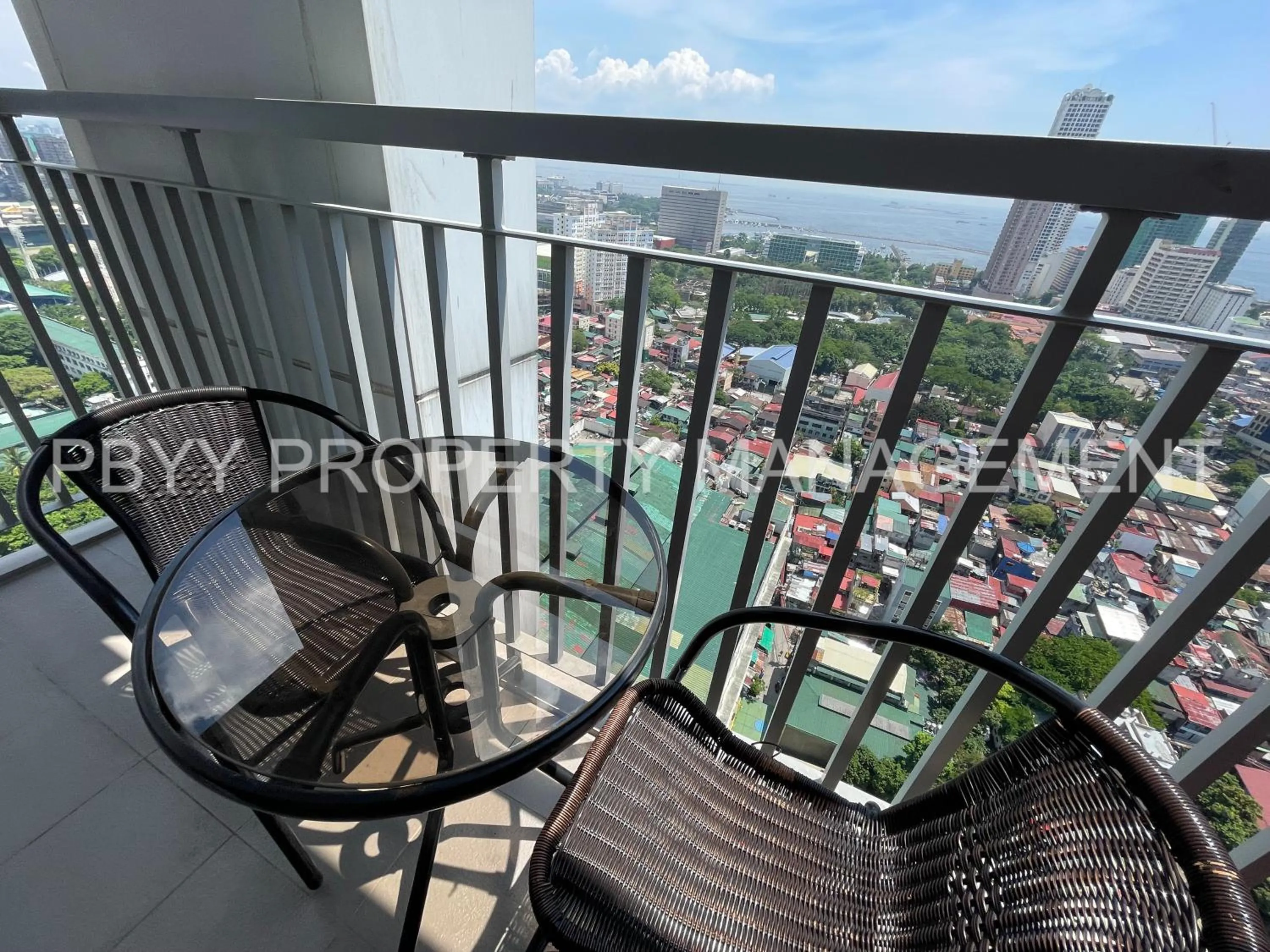 Balcony/Terrace in Green Residences Stays by PBYY