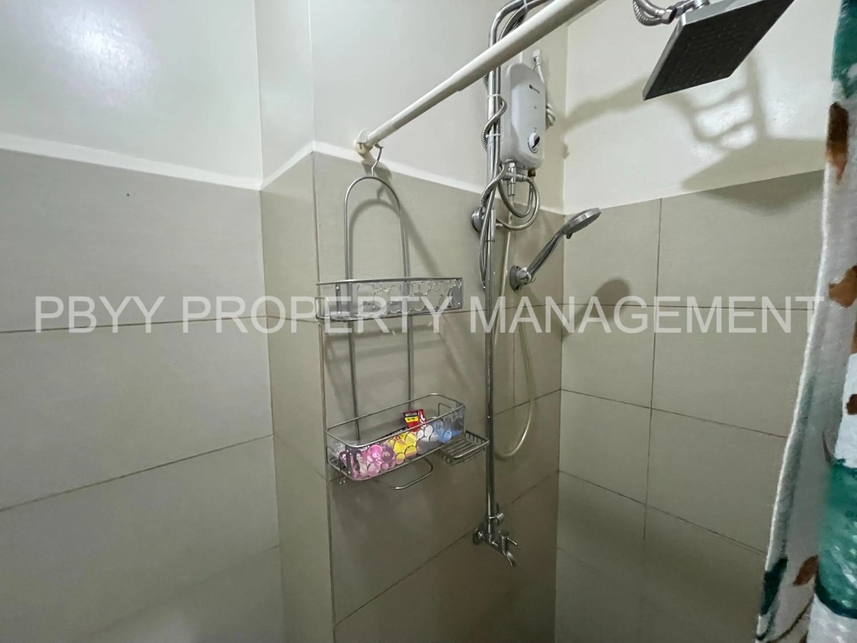 Bathroom in Green Residences Stays by PBYY