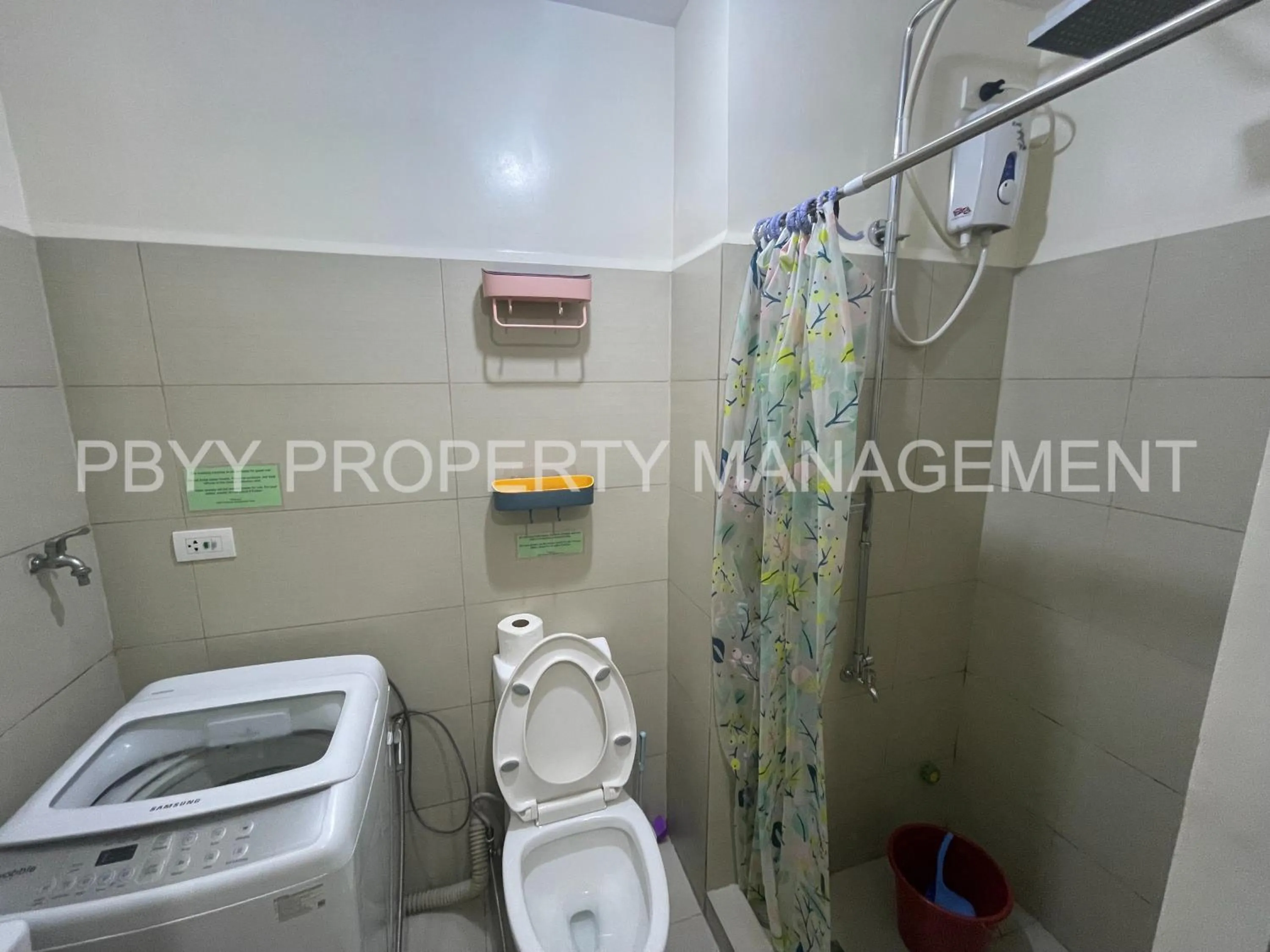 Bathroom in Green Residences Stays by PBYY