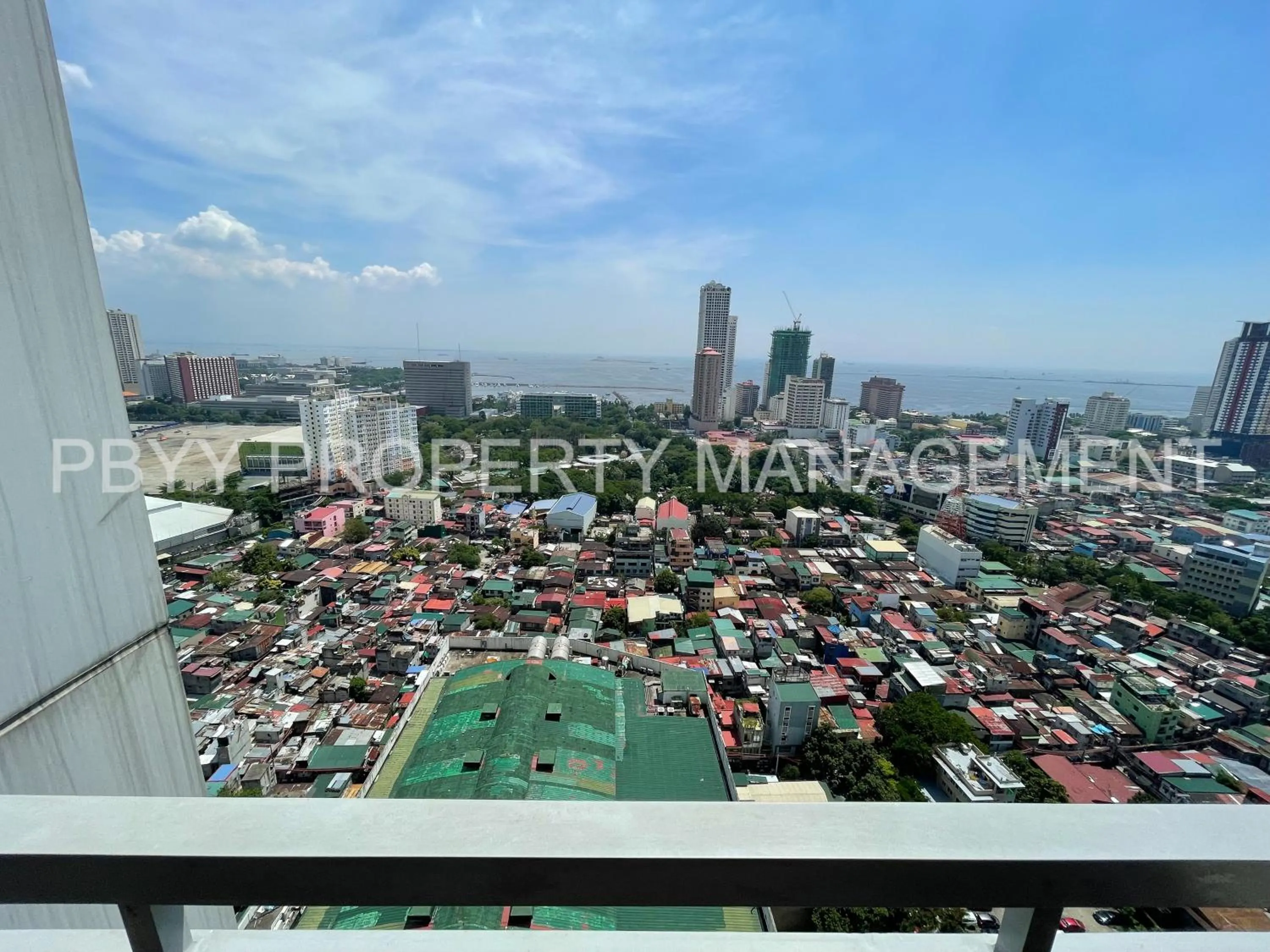 Balcony/Terrace in Green Residences Stays by PBYY