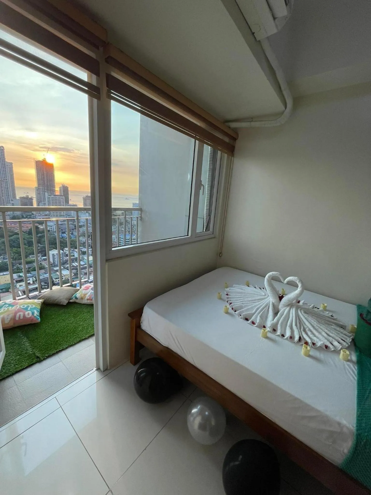 Bed in Green Residences Stays by PBYY