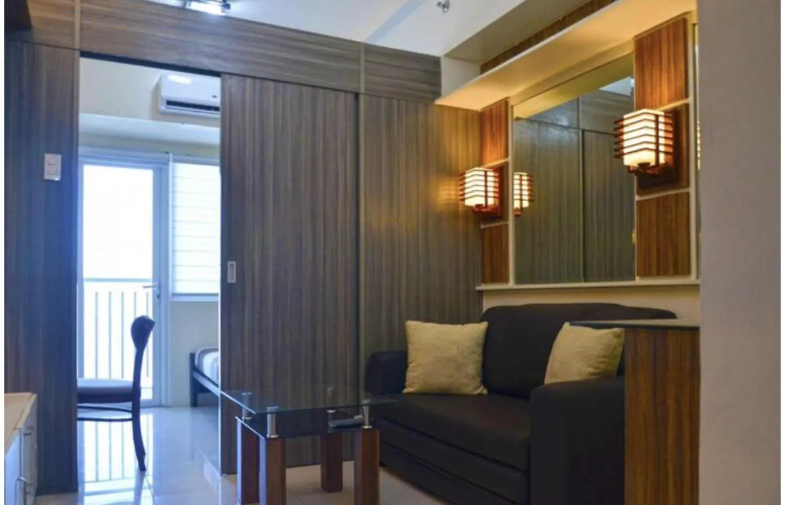 Living room, Seating Area in Green Residences Stays by PBYY