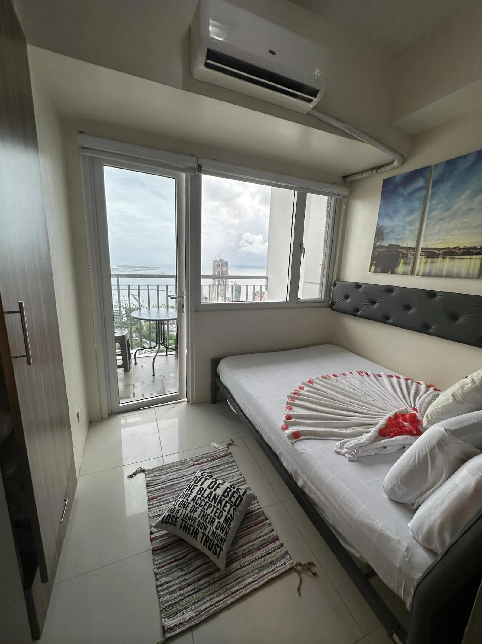 Bed in Green Residences Stays by PBYY