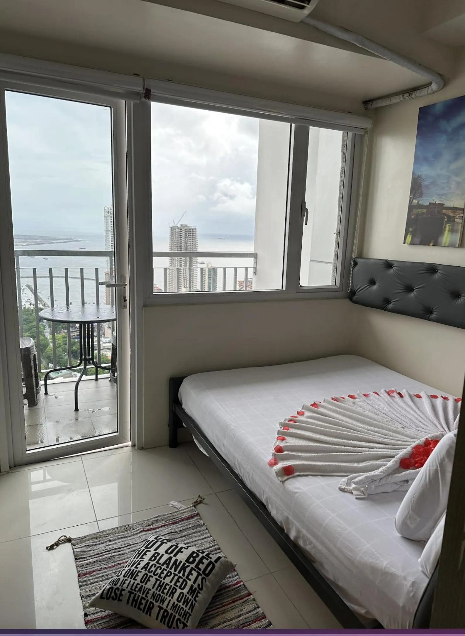 Bed in Green Residences Stays by PBYY