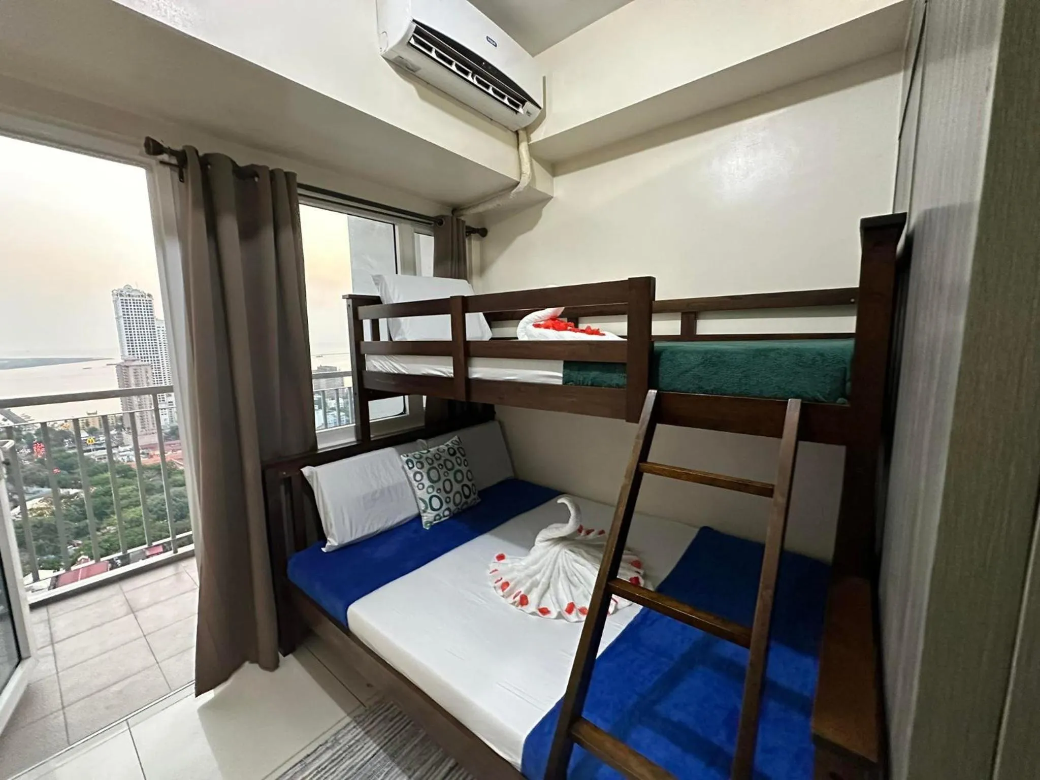 Bed, Bunk Bed in Green Residences Stays by PBYY