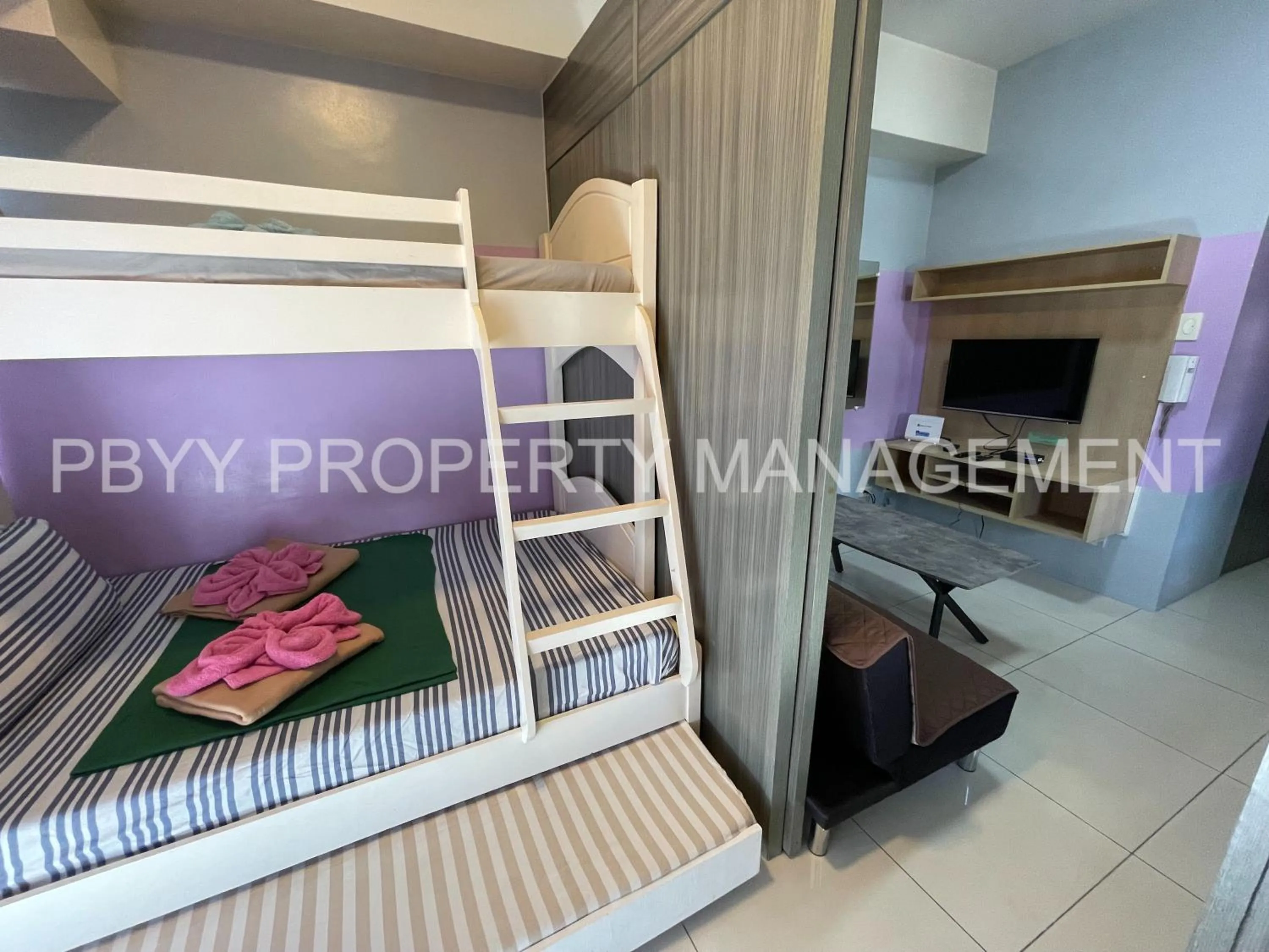 TV and multimedia, Bunk Bed in Green Residences Stays by PBYY