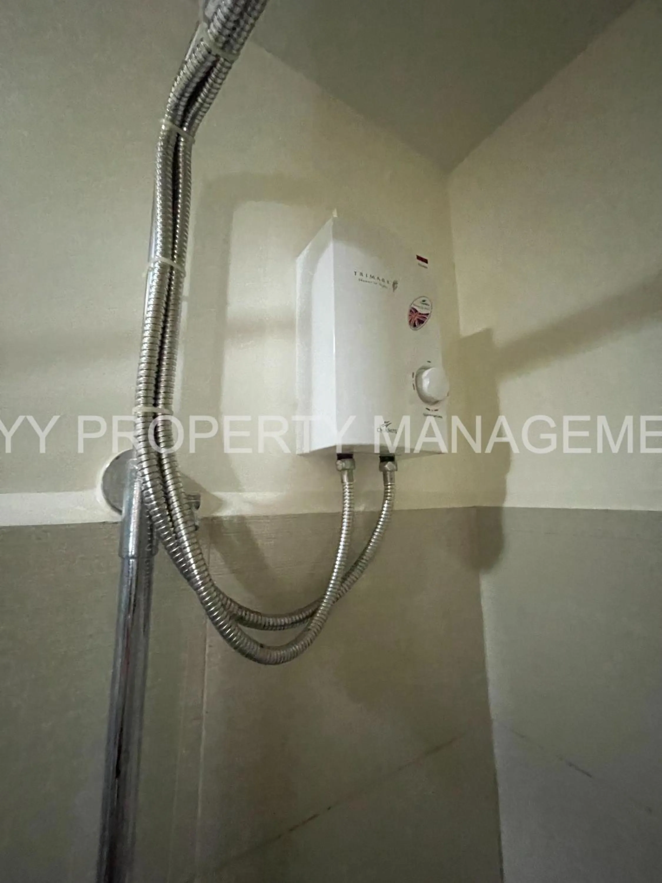 Bathroom in Green Residences Stays by PBYY