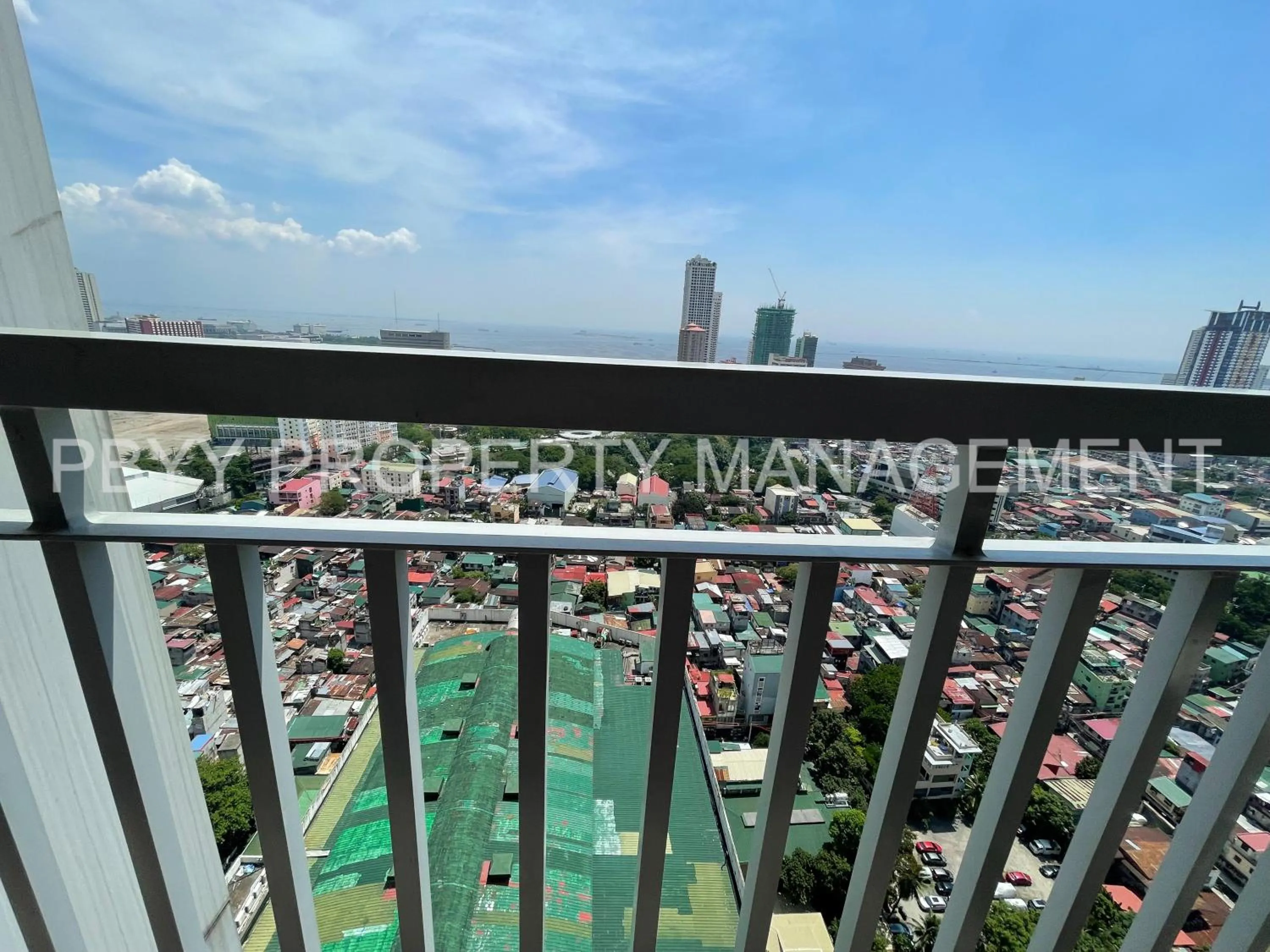 Balcony/Terrace in Green Residences Stays by PBYY