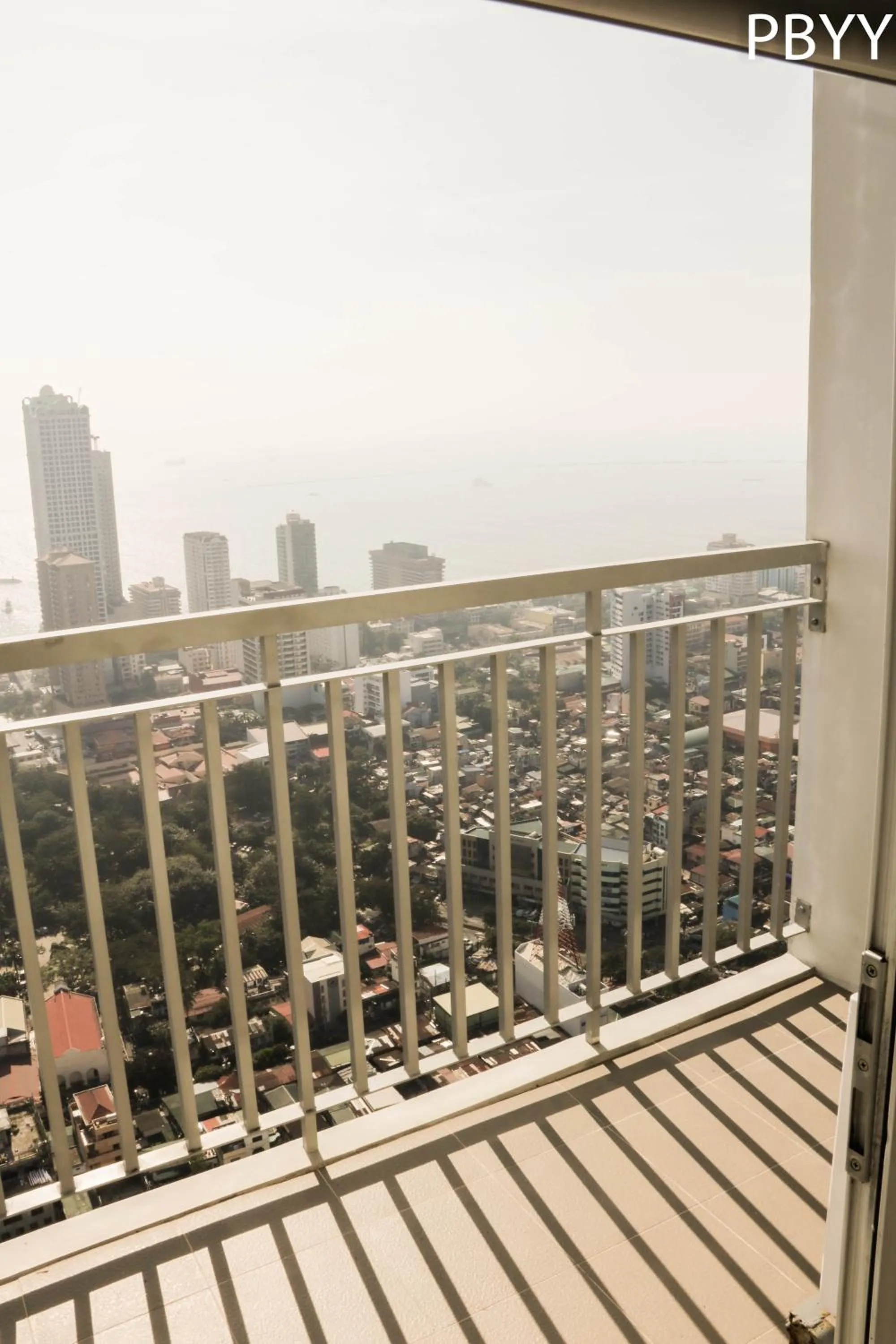 Balcony/Terrace in Green Residences Stays by PBYY