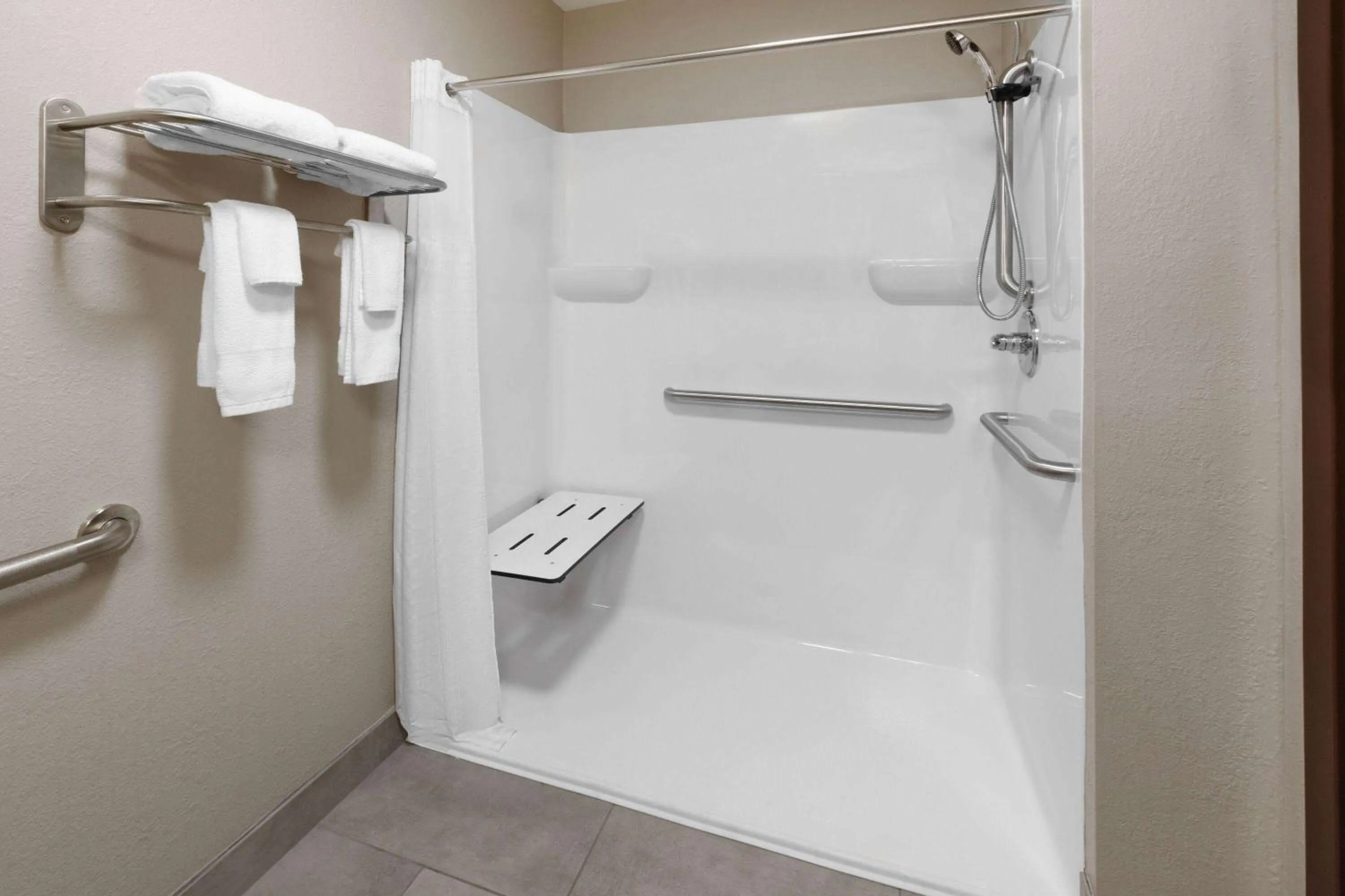 Shower in Super 8 by Wyndham Fairmont