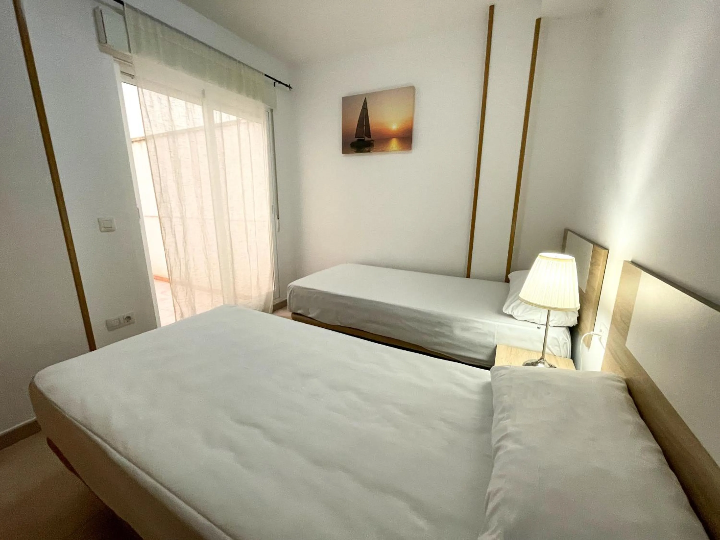 Bed in Apartamentos Neptuno 3000