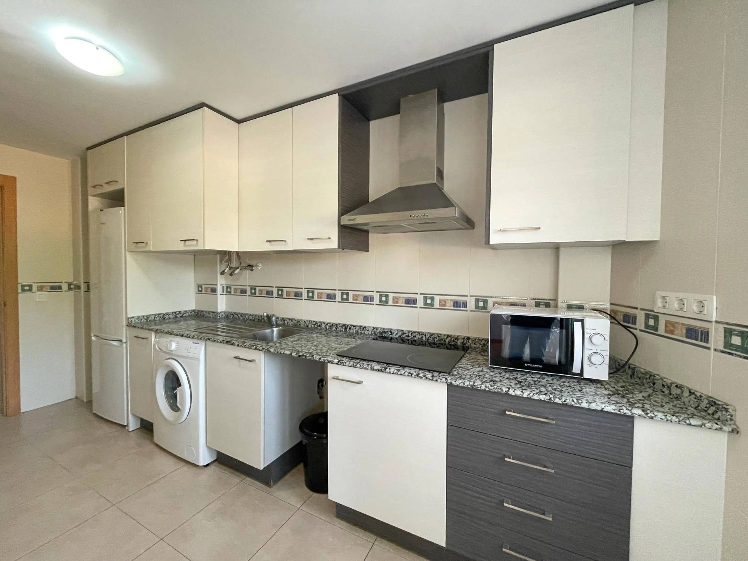 Kitchen or kitchenette in Apartamentos Neptuno 3000