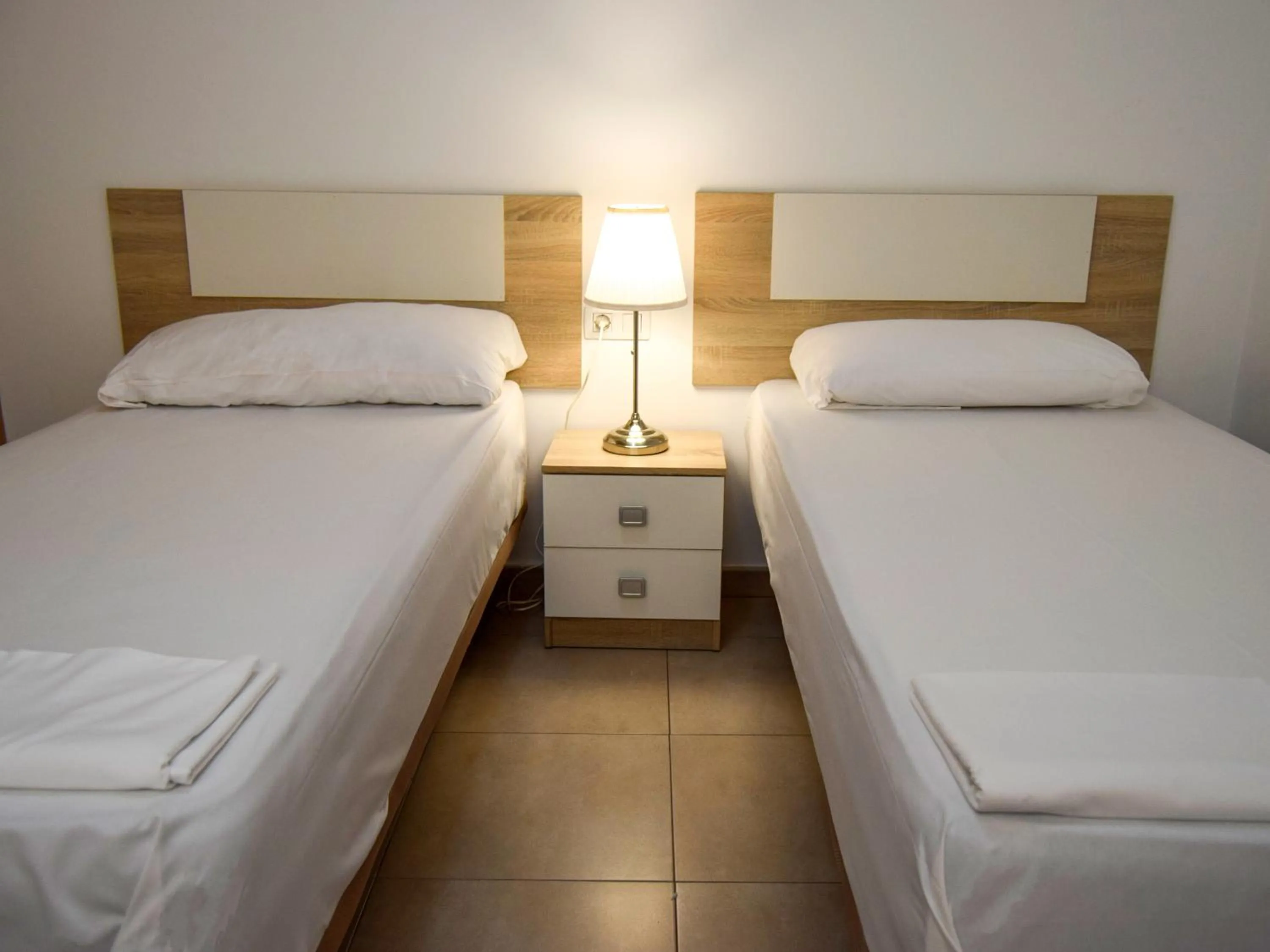 Bed in Apartamentos Neptuno 3000