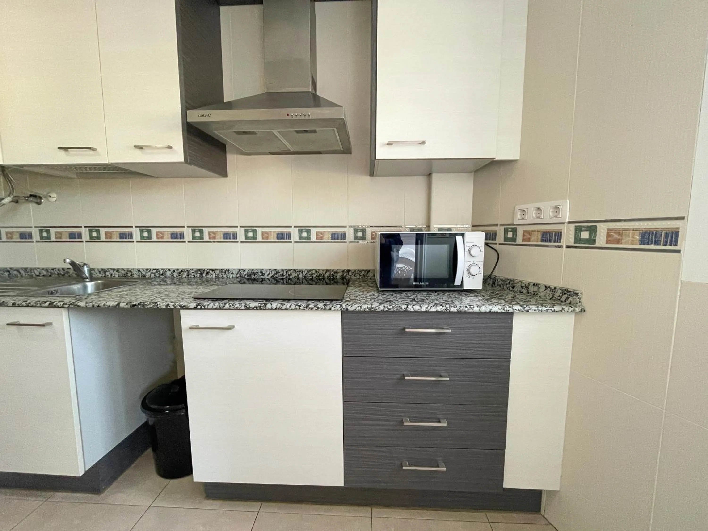 Kitchen or kitchenette in Apartamentos Neptuno 3000