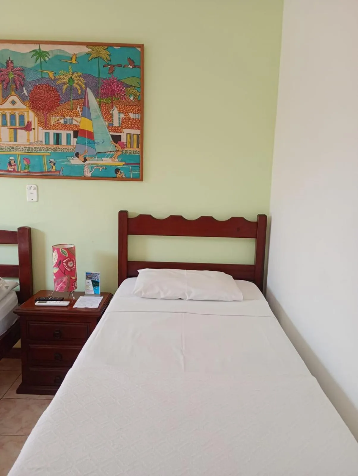 Bed in Pousada Alecrim Dourado