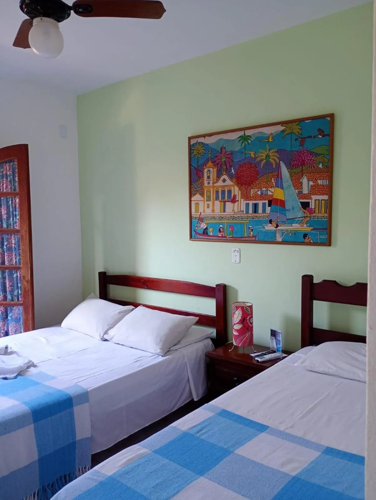 Bed in Pousada Alecrim Dourado