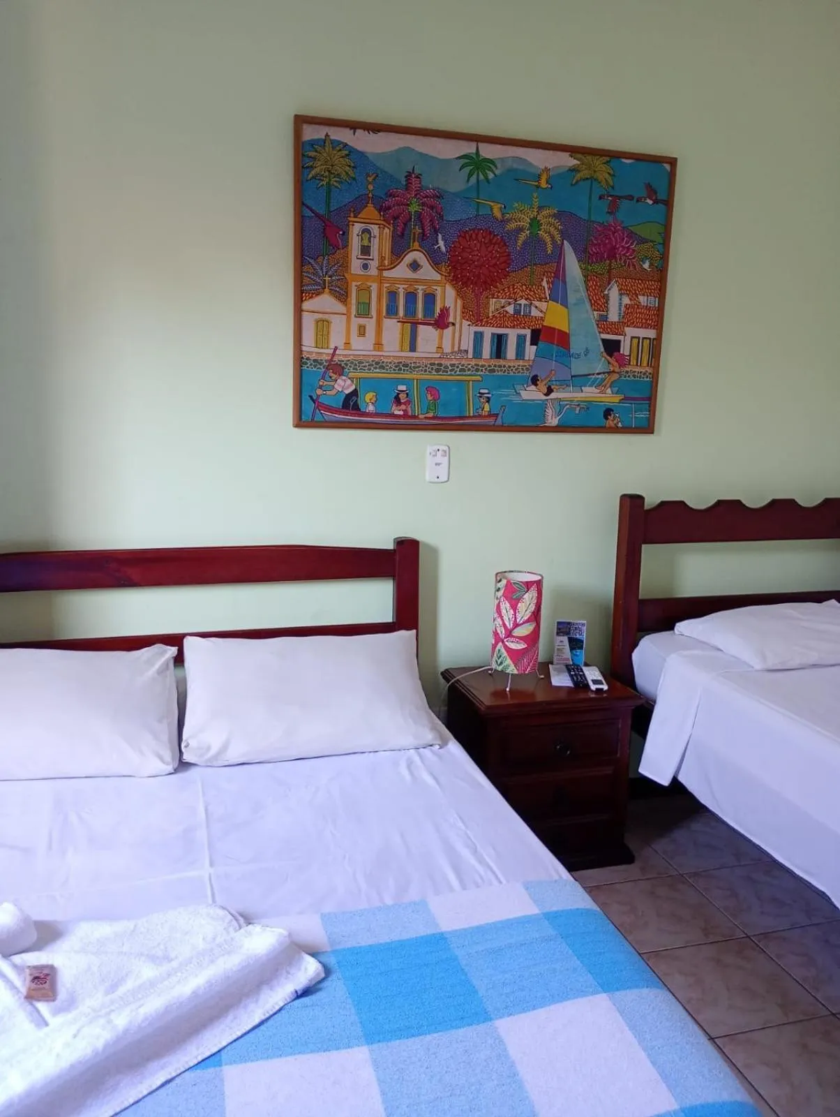 Bed in Pousada Alecrim Dourado