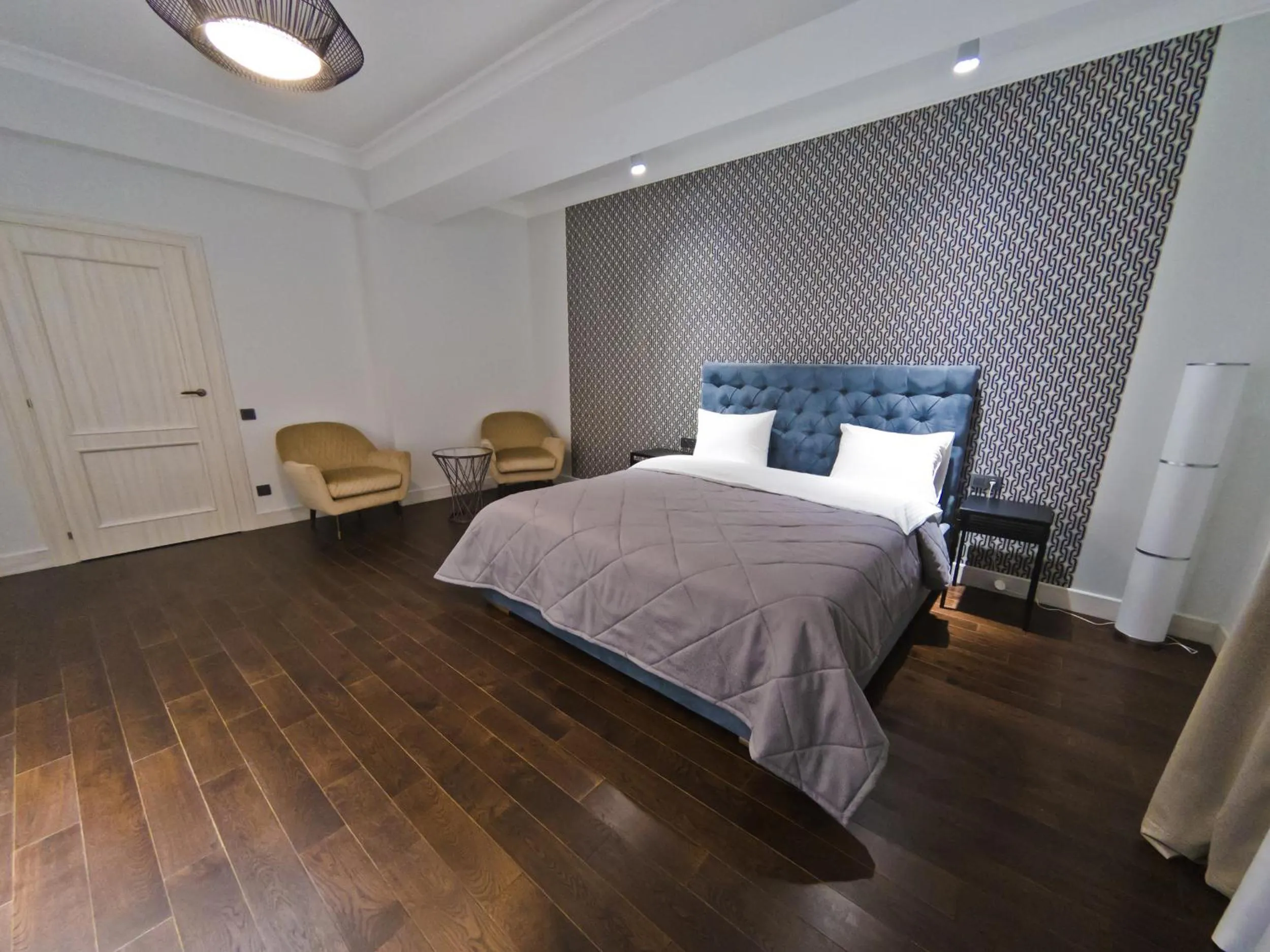 Photo of the whole room, Bed in Opera Apartments Almaty