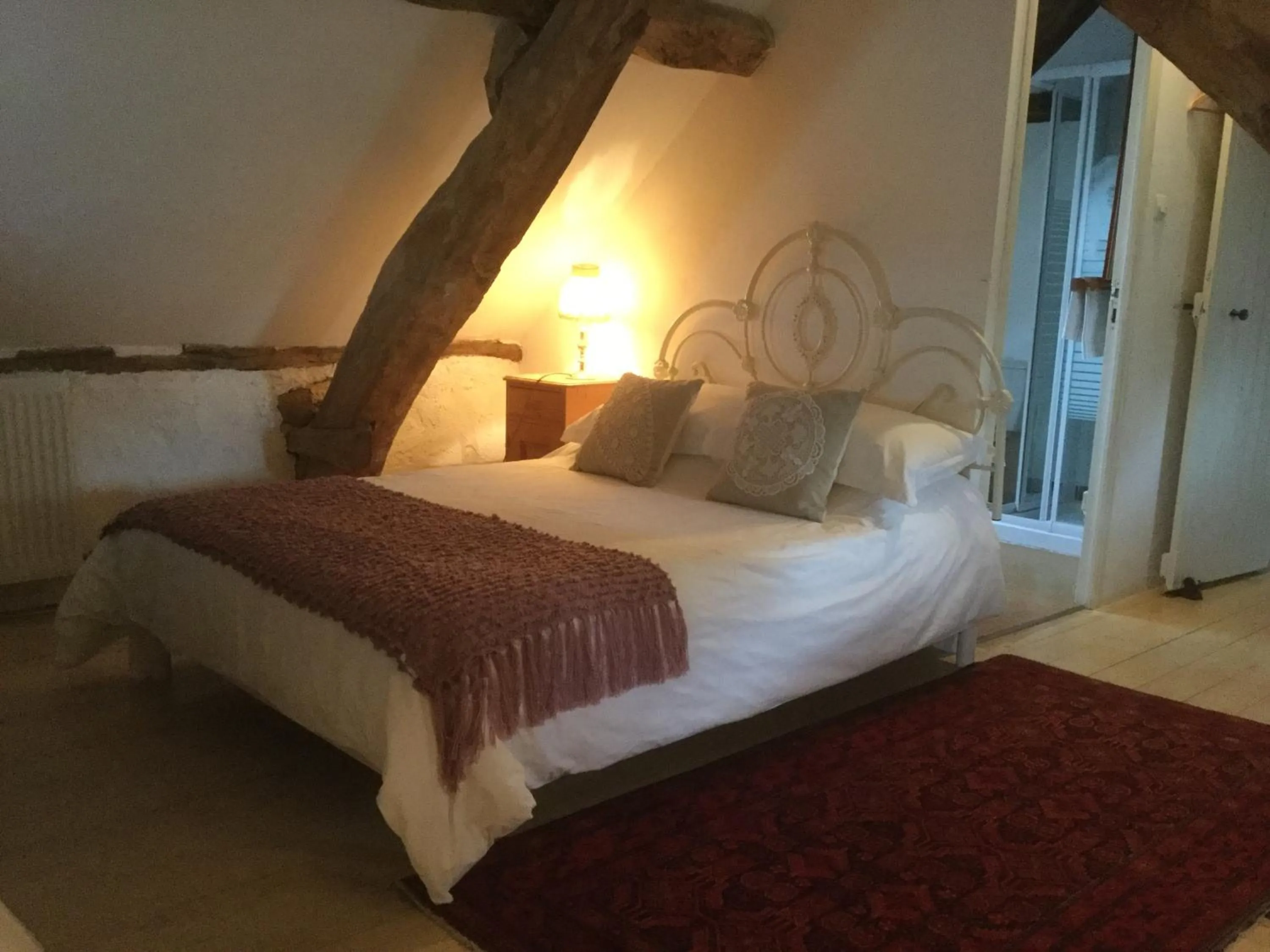 Bed in Pérard Chambres D’Hotes