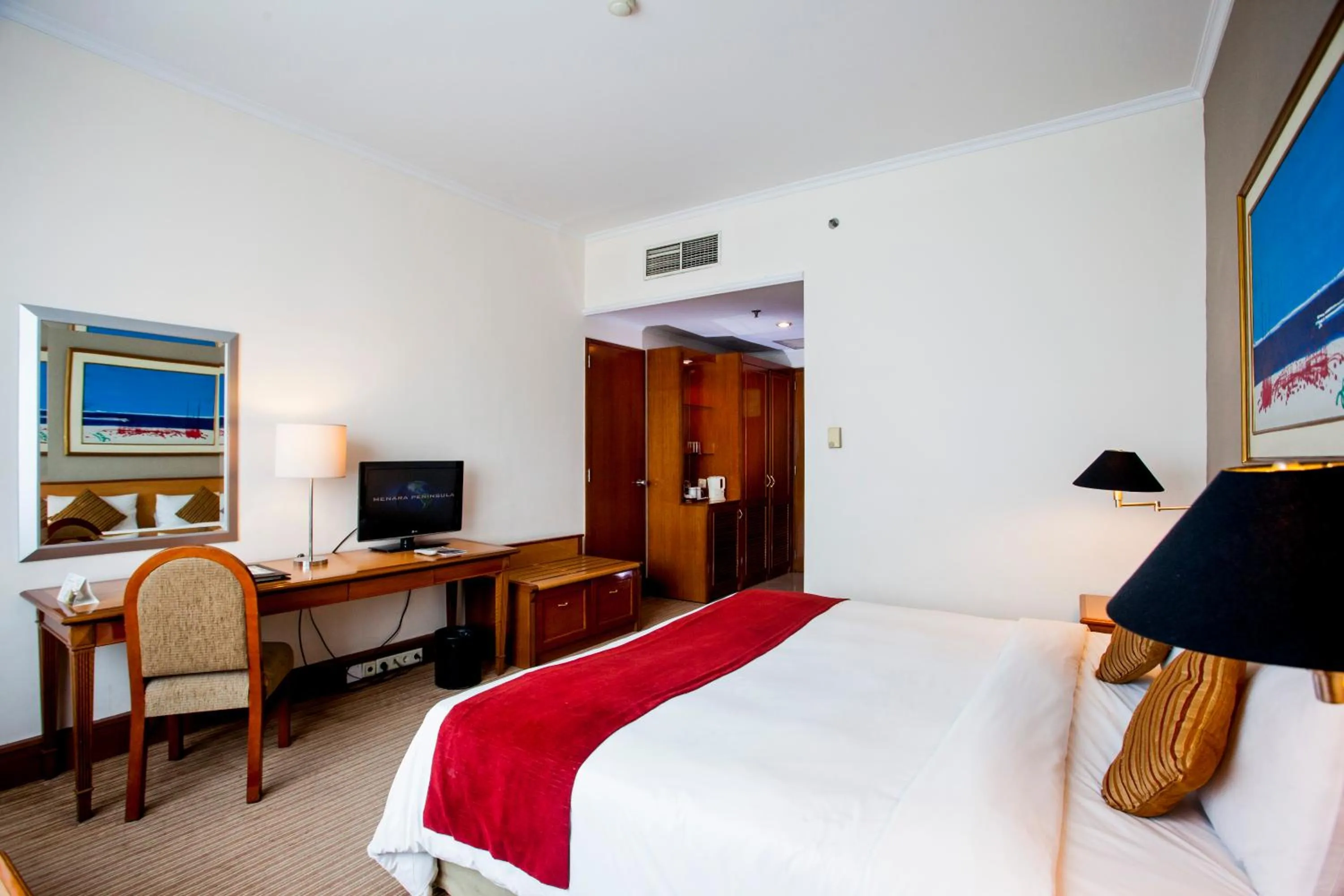 Bed in Menara Peninsula Hotel