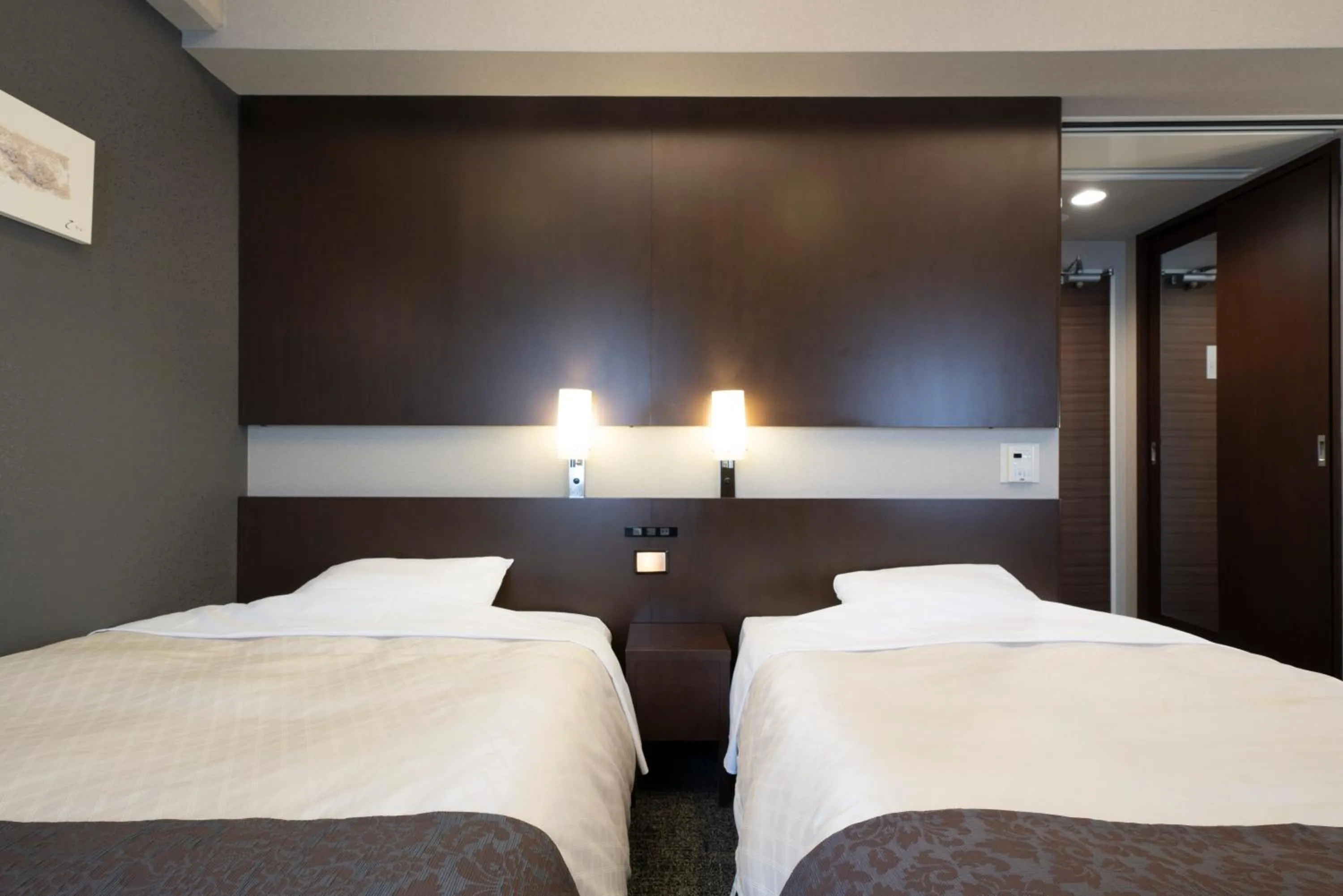 Bed in Hotel Binario Umeda