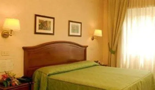 Bed in Hotel San Pietro