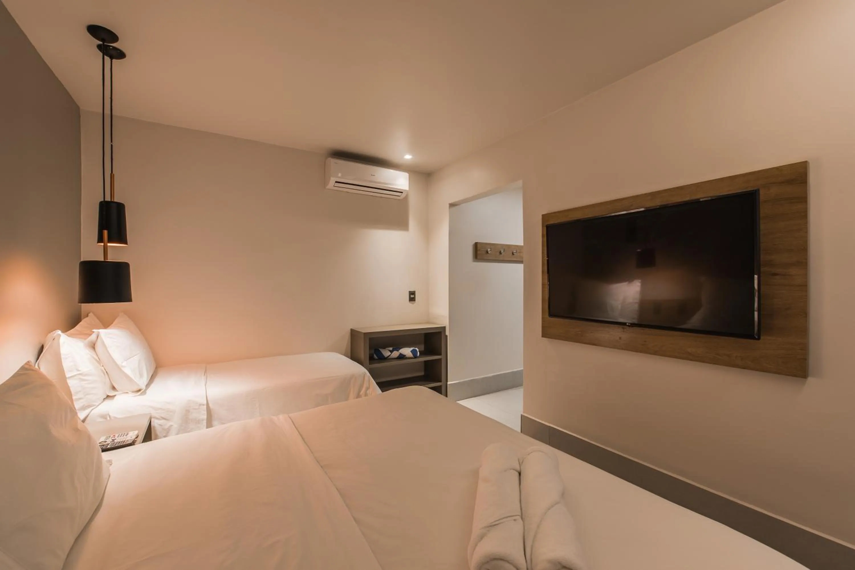 Communal lounge/ TV room, Bed in Pousada Corveta