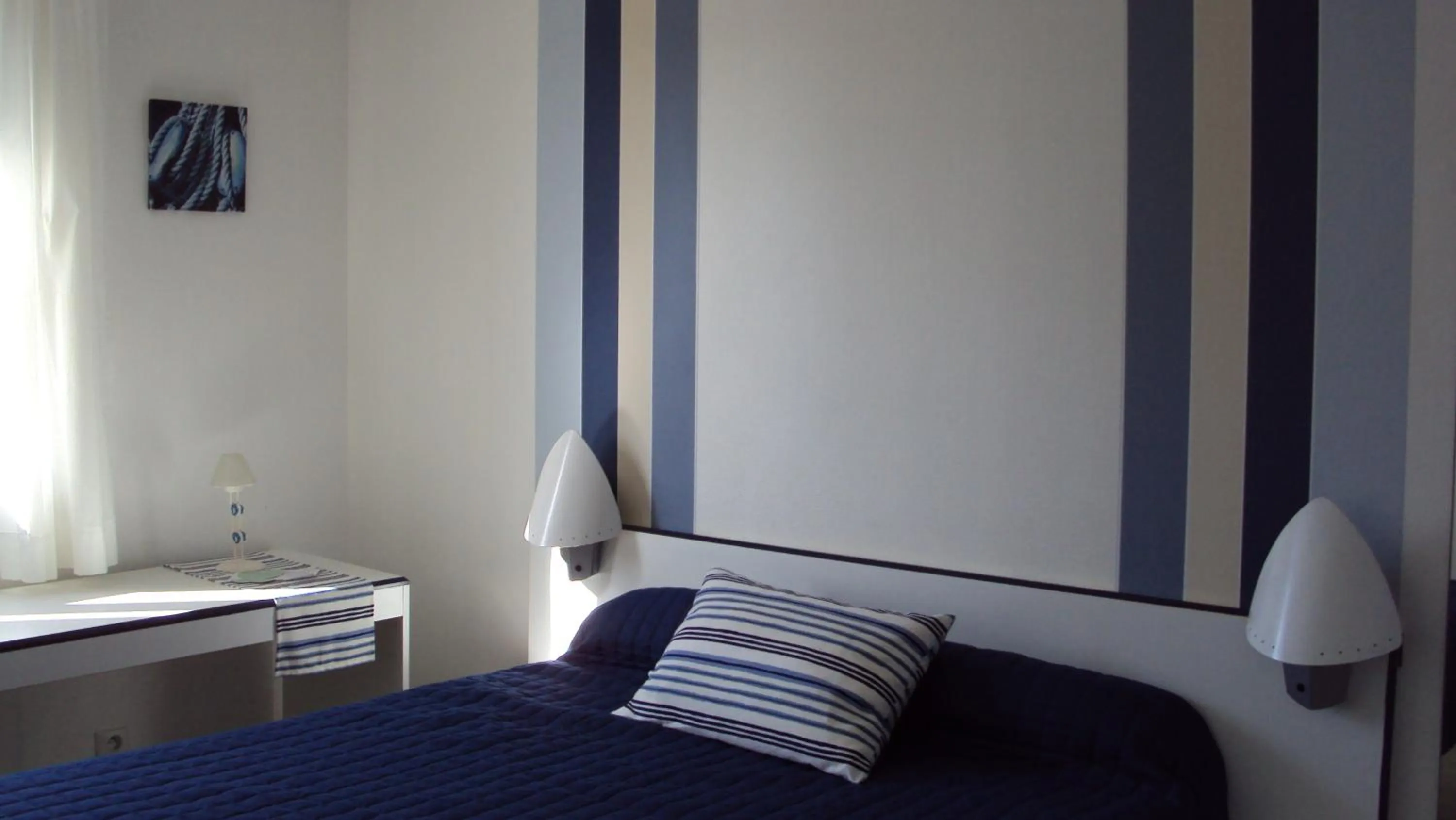 Bed in hotel l'échappée d'oléron