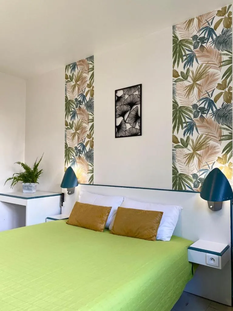 Bed in hotel l'échappée d'oléron