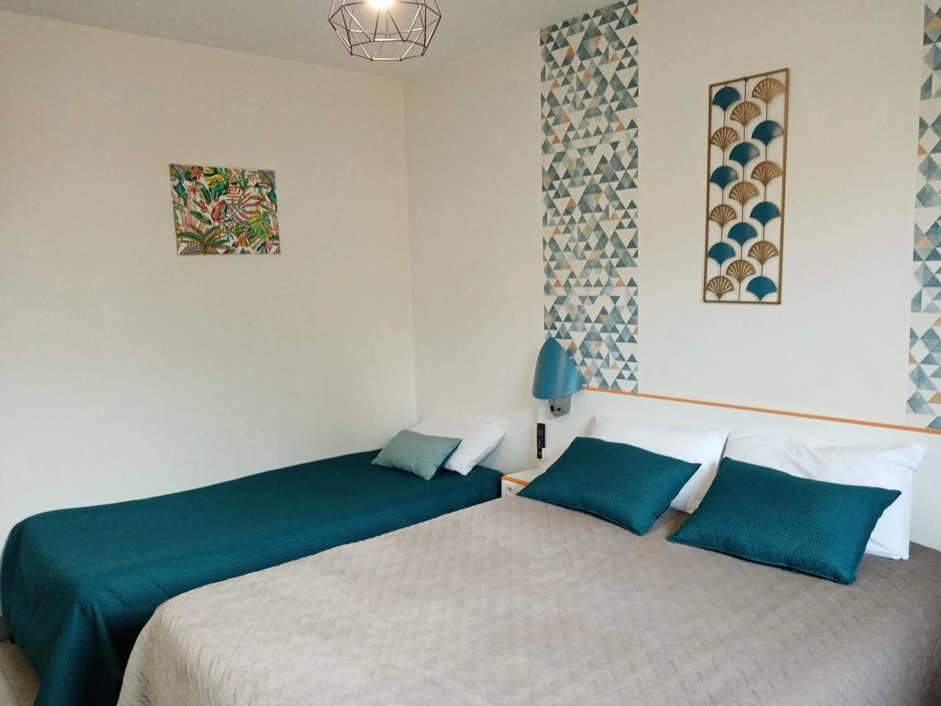 Bed in hotel l'échappée d'oléron