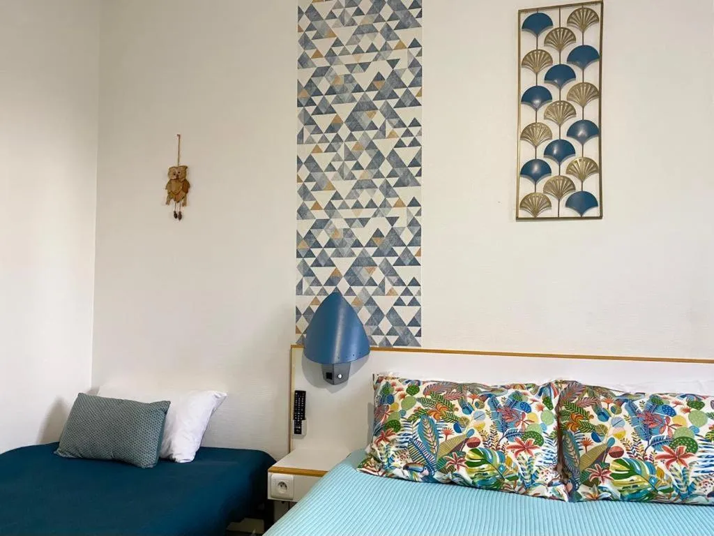 Bed in hotel l'échappée d'oléron