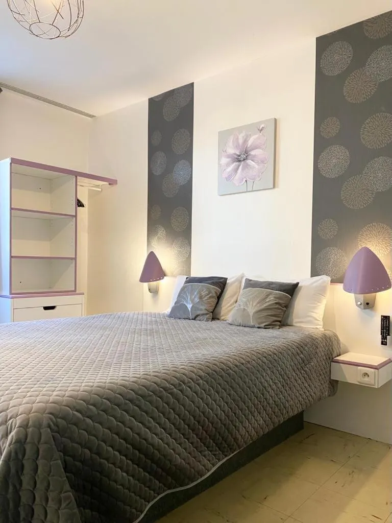 Bed in hotel l'échappée d'oléron