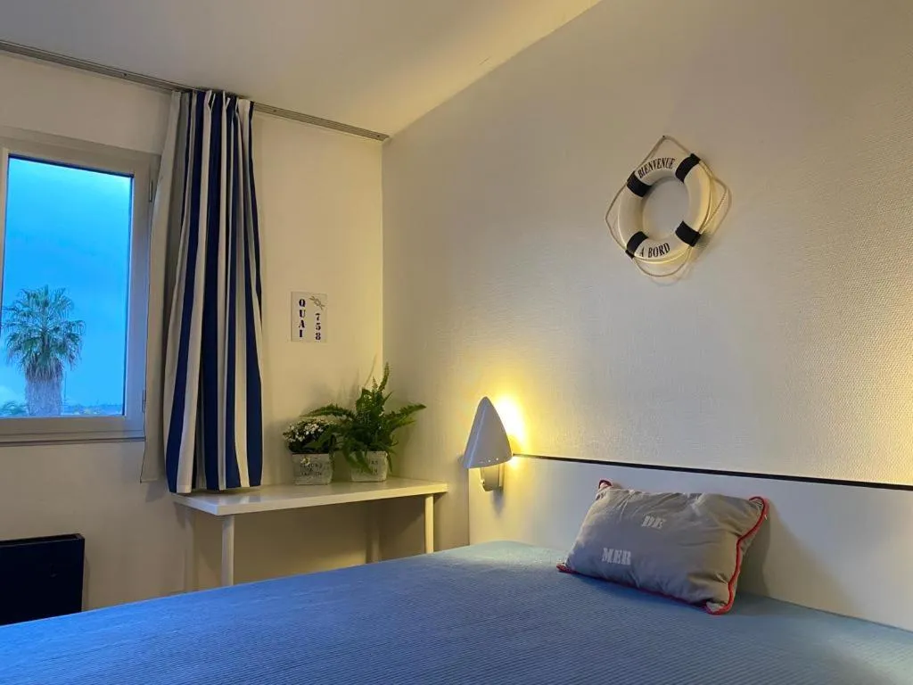 Bed in hotel l'échappée d'oléron