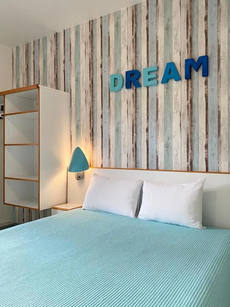 Bed in hotel l'échappée d'oléron