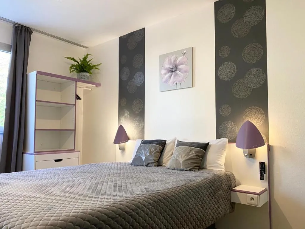 Bed in hotel l'échappée d'oléron