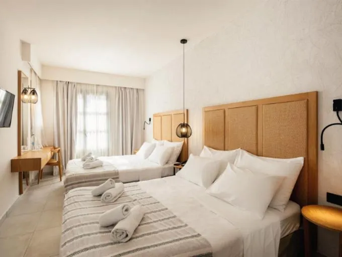 Bed in Pedi Beach Hotel