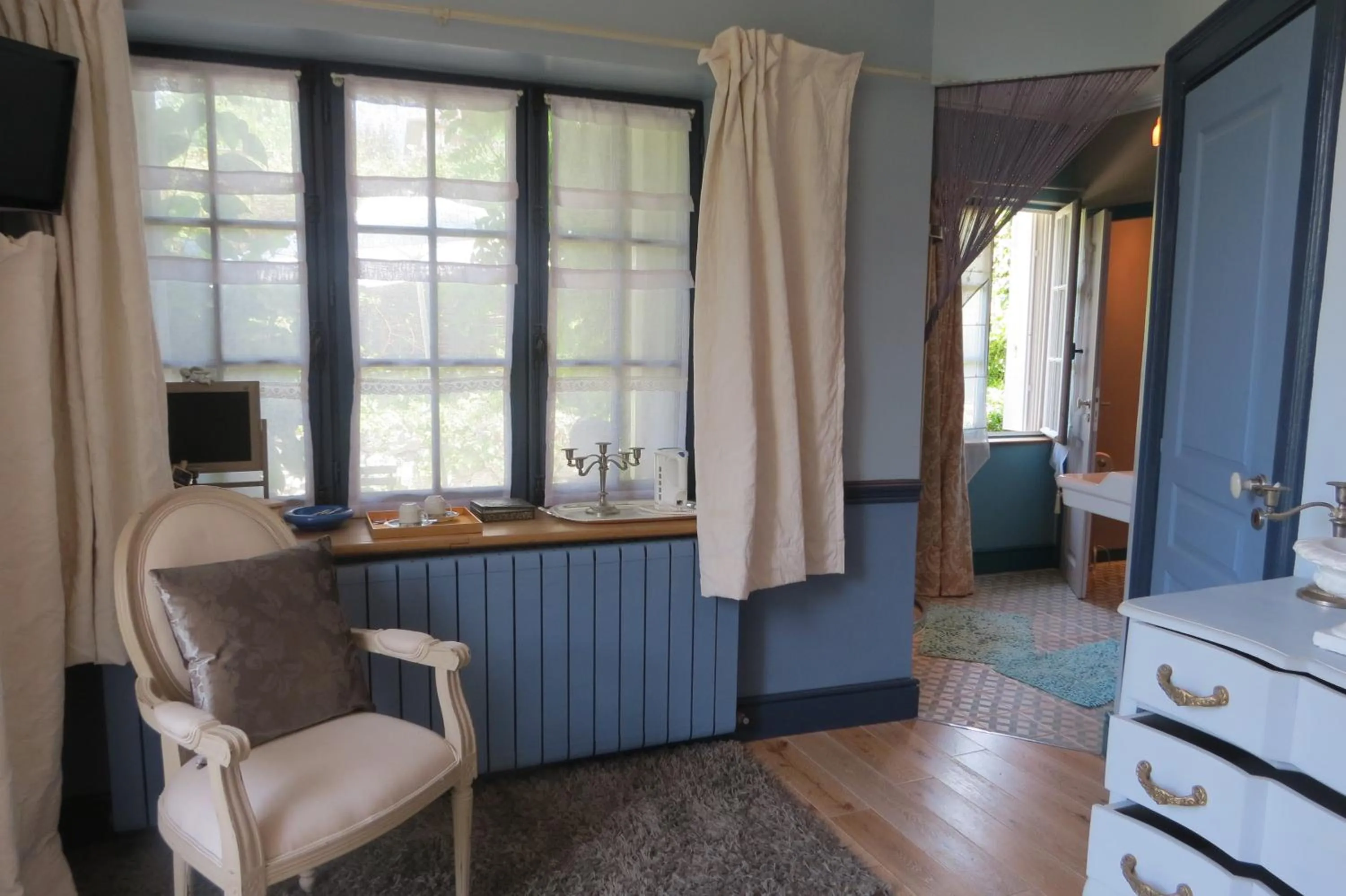 Seating area in Demeure d'Hôtes L'Hermitage